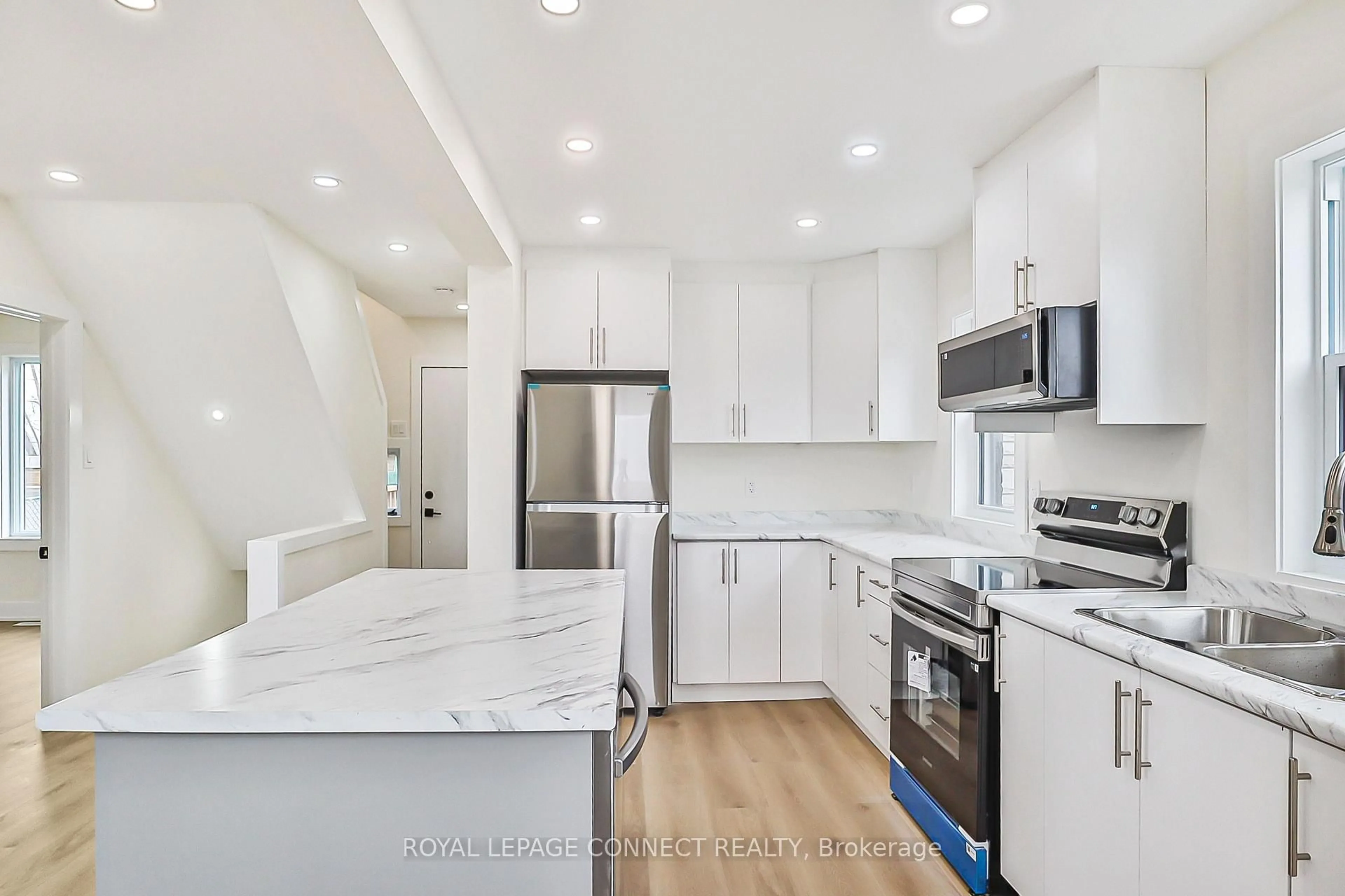 Open concept kitchen, ceramic/tile floor for 761 Guelph St, Kitchener Ontario N2H 5Z2