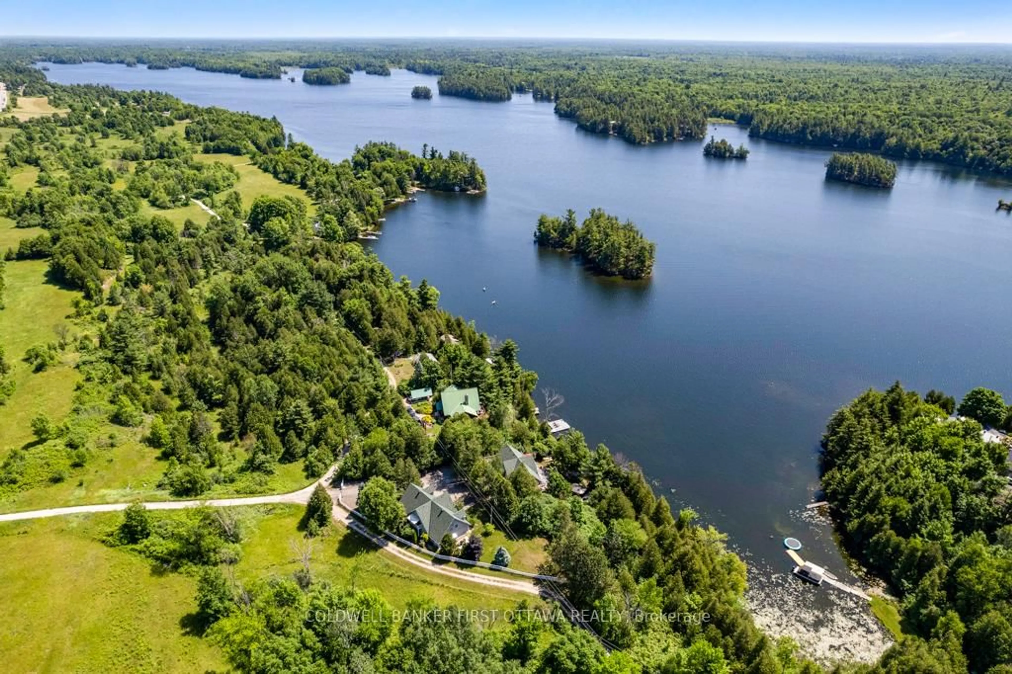 A pic from outside/outdoor area/front of a property/back of a property/a pic from drone, water/lake/river/ocean view for 320 Pike Lake Route 12 Rd, Perth Ontario K7H 3C5