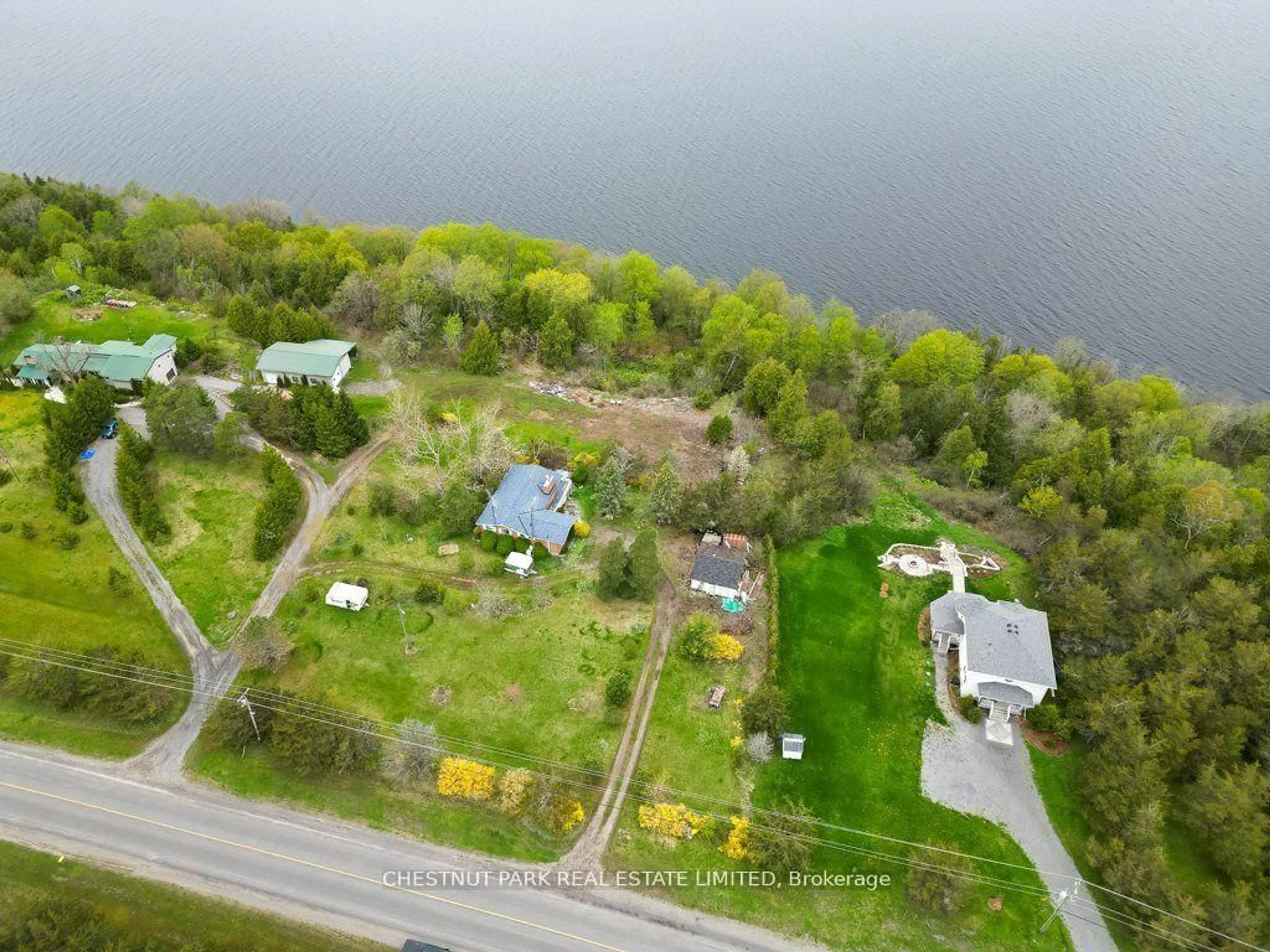 A pic from outside/outdoor area/front of a property/back of a property/a pic from drone, water/lake/river/ocean view for 2035 County Rd 7, Prince Edward County Ontario K0K 2T0