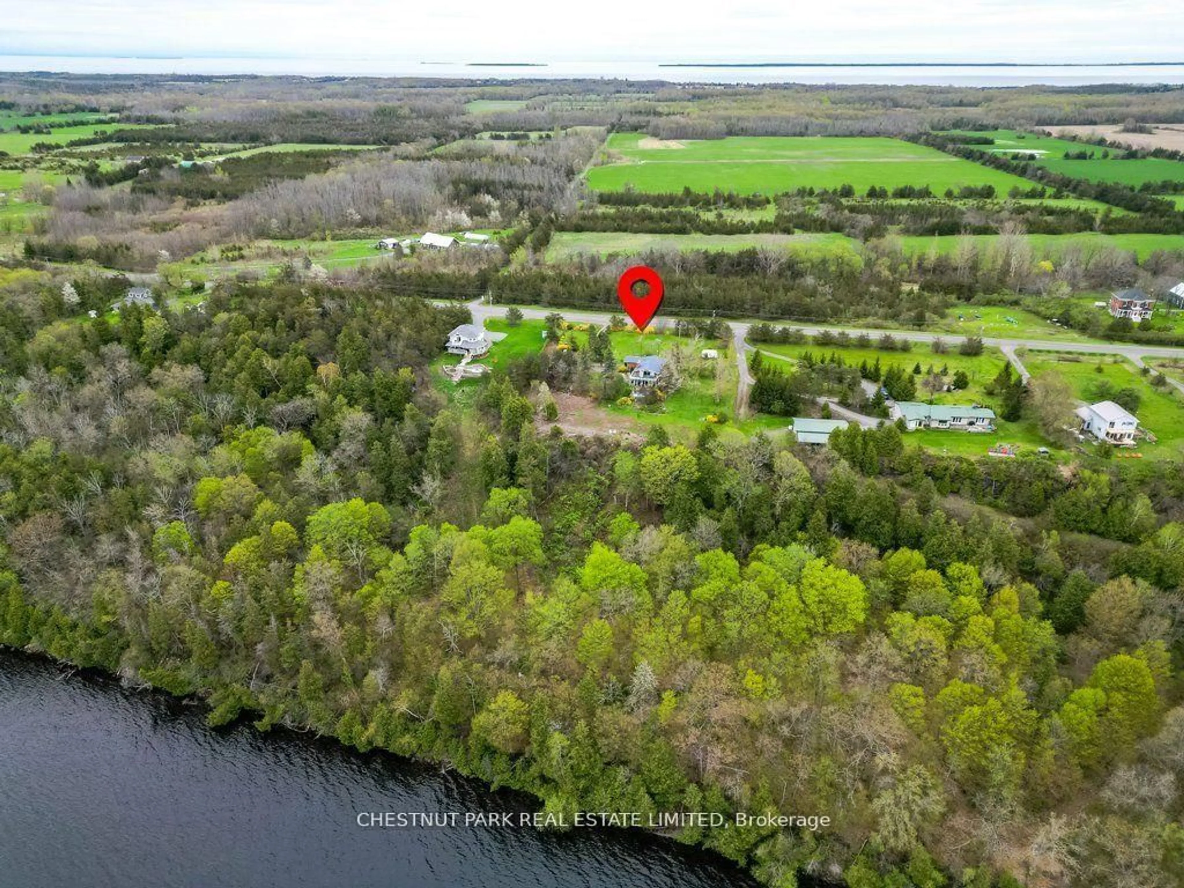A pic from outside/outdoor area/front of a property/back of a property/a pic from drone, water/lake/river/ocean view for 2035 County Rd 7, Prince Edward County Ontario K0K 2T0