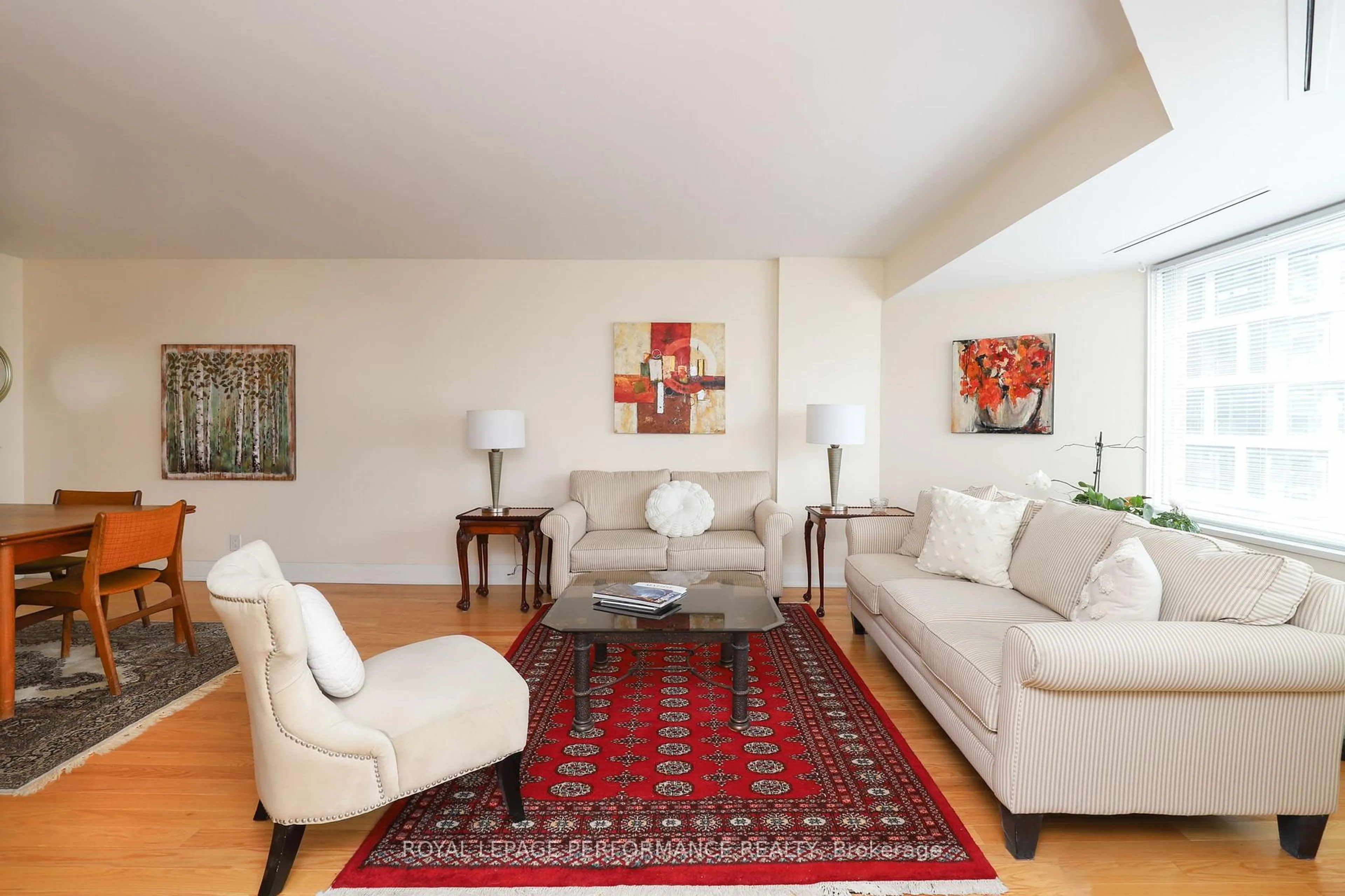 Living room with furniture, carpet floor for 151 Bay St #802, Ottawa Ontario K1R 7T2