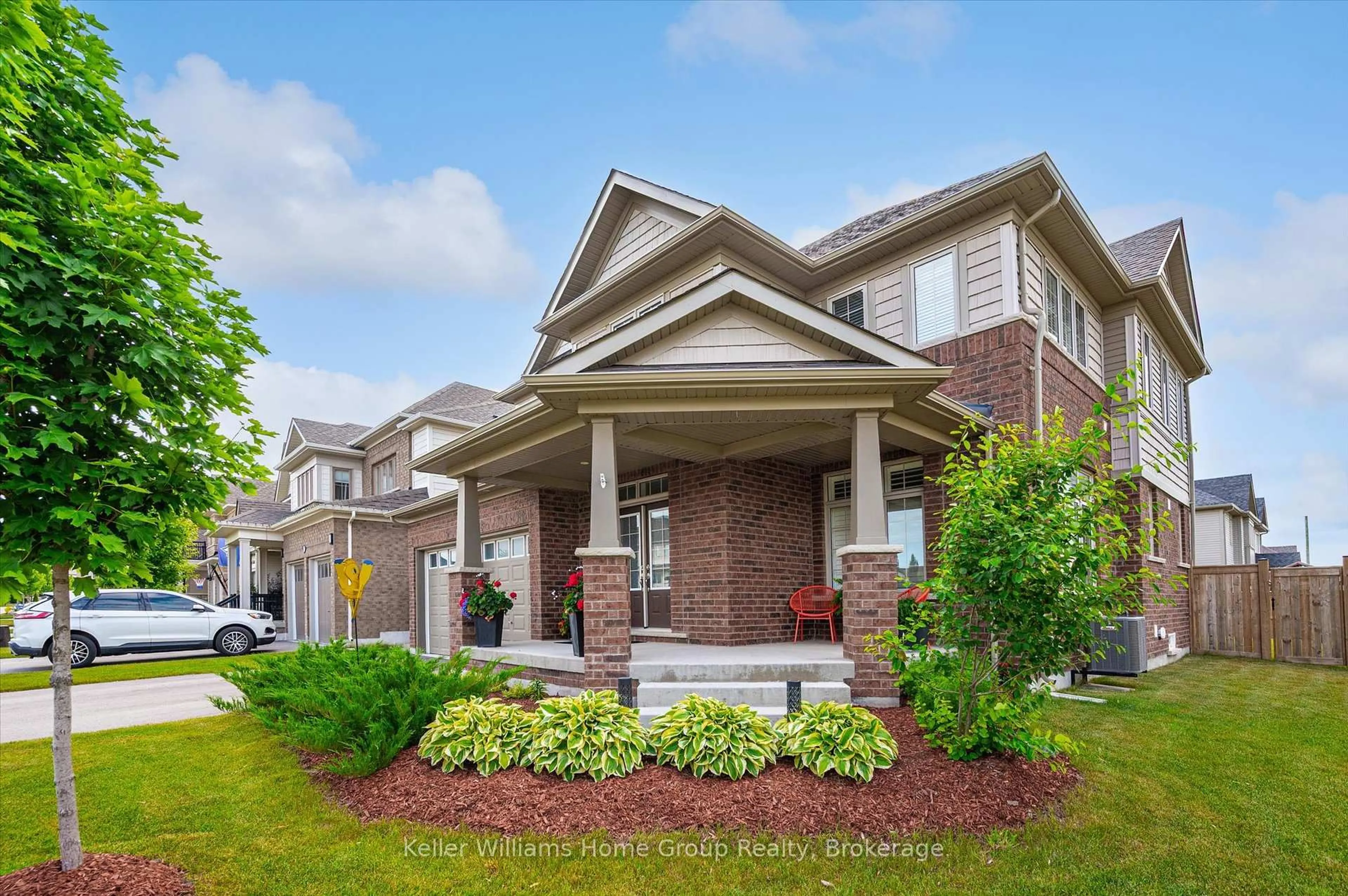 Home with brick exterior material, street for 11 Harpin Way, Centre Wellington Ontario N1M 0H2