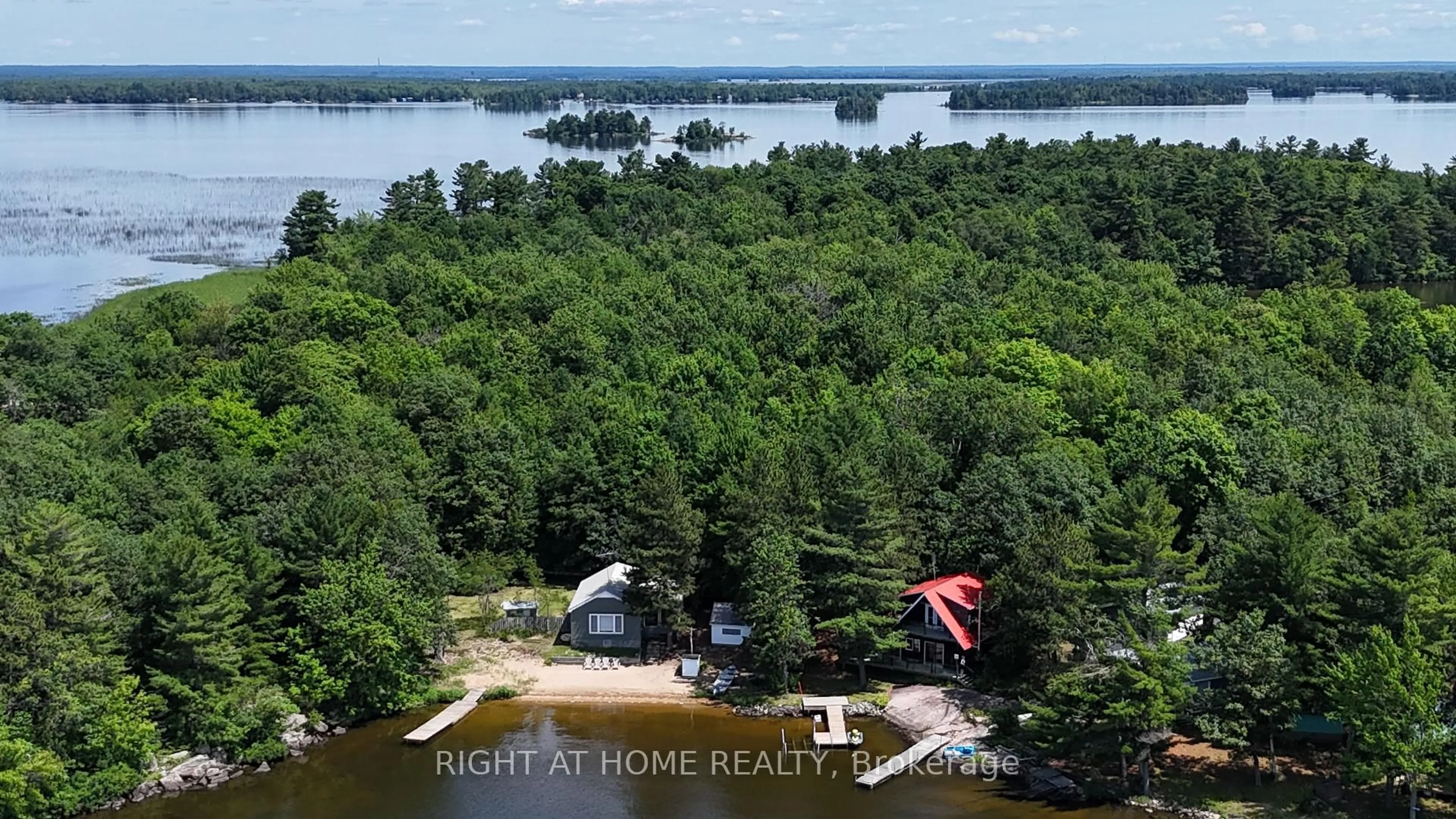 A pic from outside/outdoor area/front of a property/back of a property/a pic from drone, water/lake/river/ocean view for WC21 Hardwood Island East, West Nipissing Ontario P2B 2M9