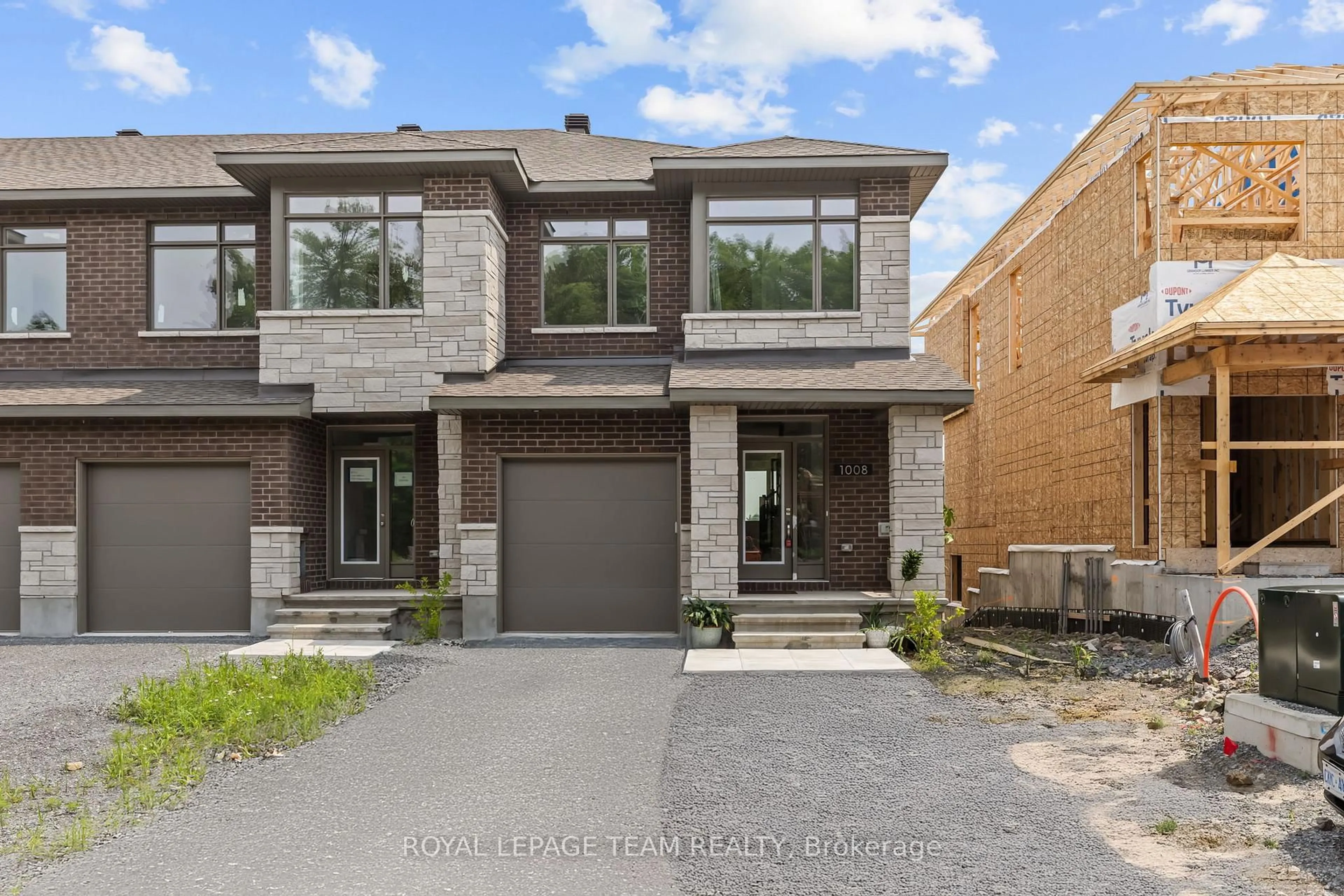 Home with brick exterior material, street for 1008 Kitigan Grve, Kanata Ontario K2K 0N1