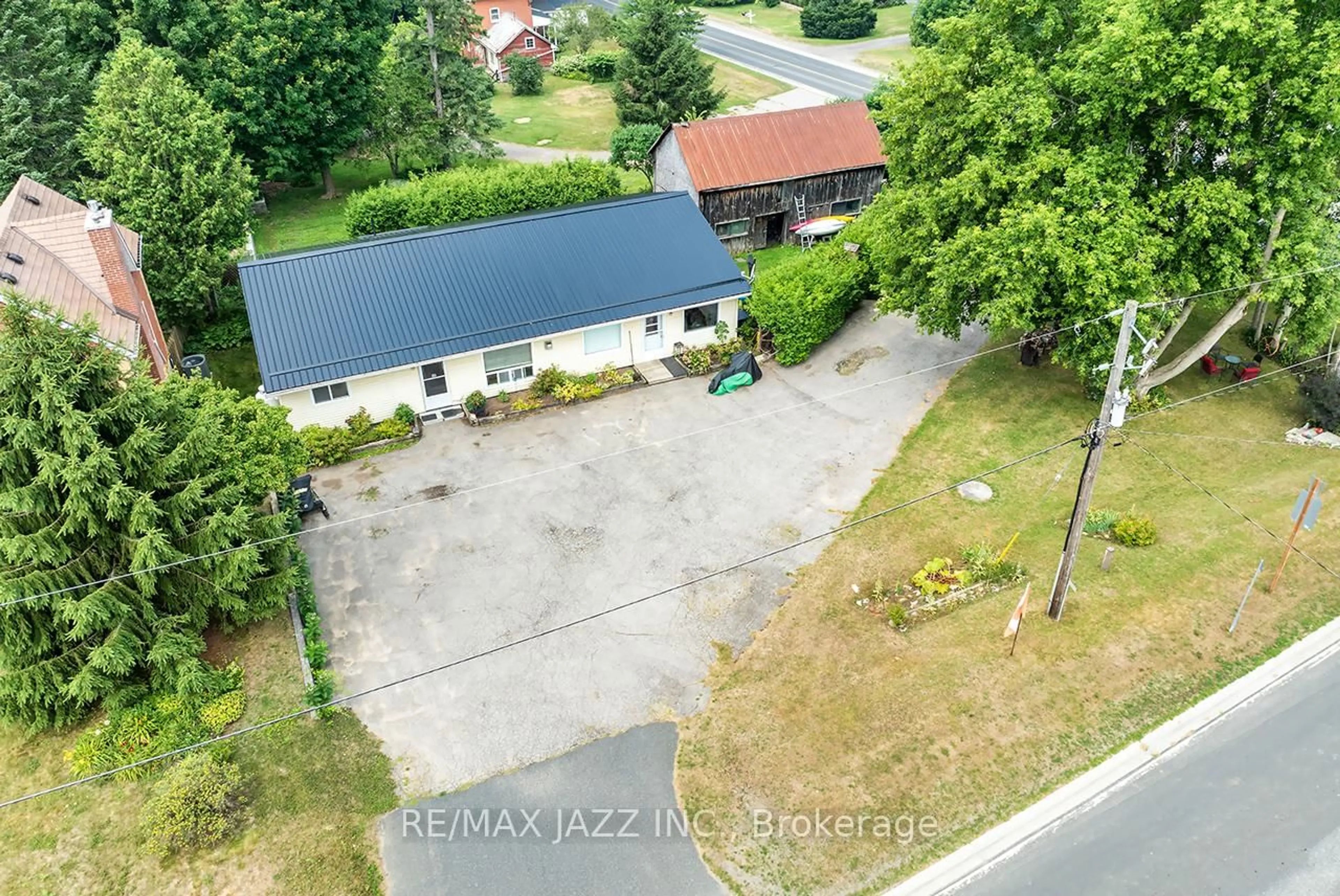 A pic from outside/outdoor area/front of a property/back of a property/a pic from drone, street for 7986 County Rd 65 A&B, Port Hope Ontario L0A 1B0