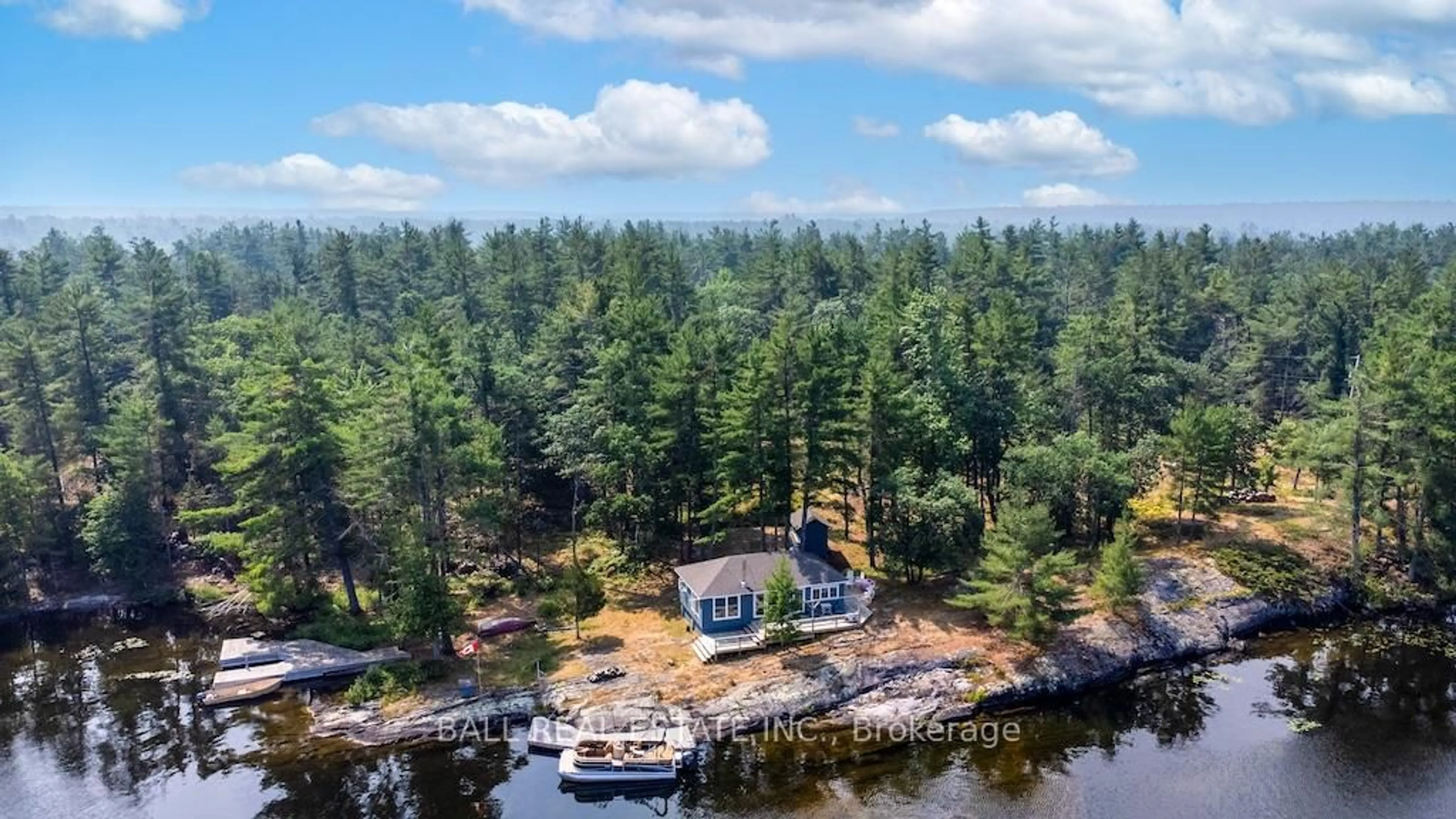 A pic from outside/outdoor area/front of a property/back of a property/a pic from drone, water/lake/river/ocean view for 4446 Is 107 Stoney Lake, North Kawartha Ontario K0L 2H0