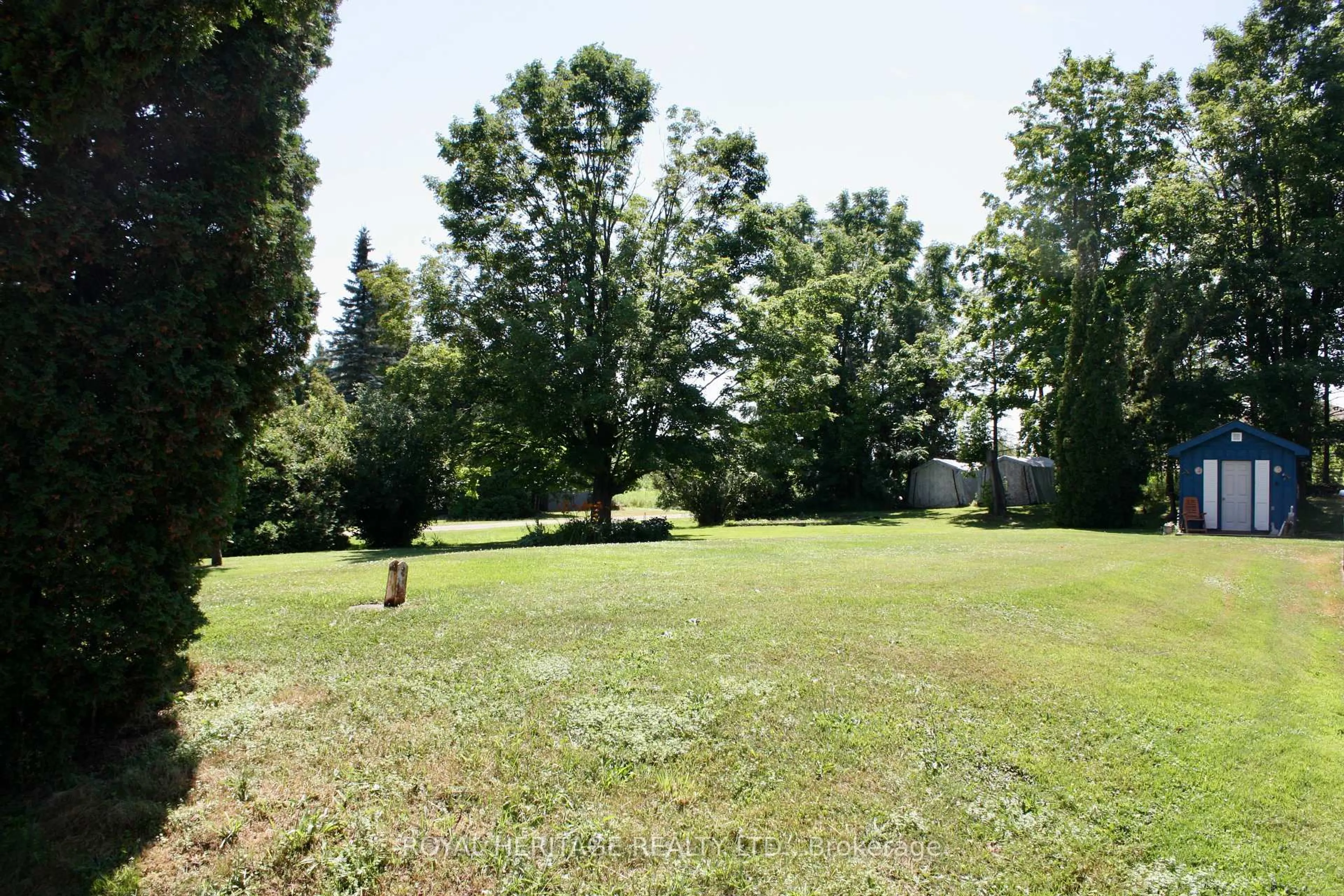 A pic from outside/outdoor area/front of a property/back of a property/a pic from drone, forest/trees view for 634 Brick Rd, Selwyn Ontario K0L 1T0
