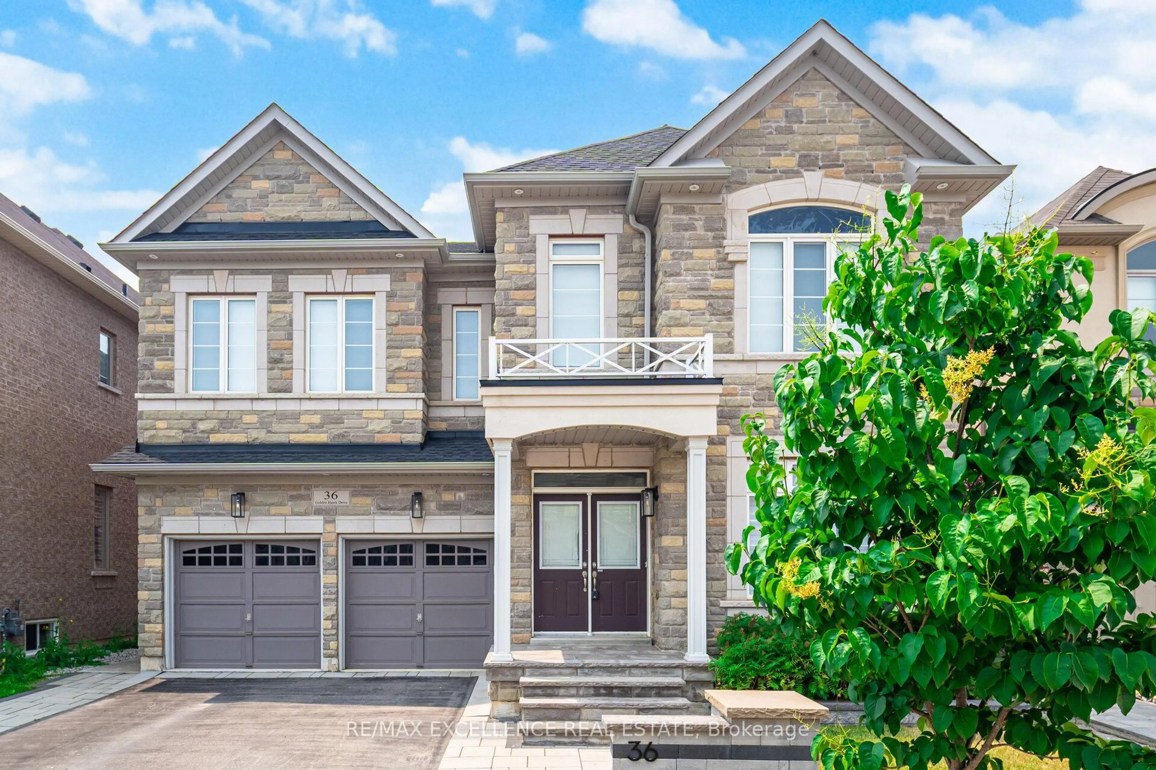 Home with brick exterior material, street for 36 Golden Hawk Dr, Hamilton Ontario L8B 1W8