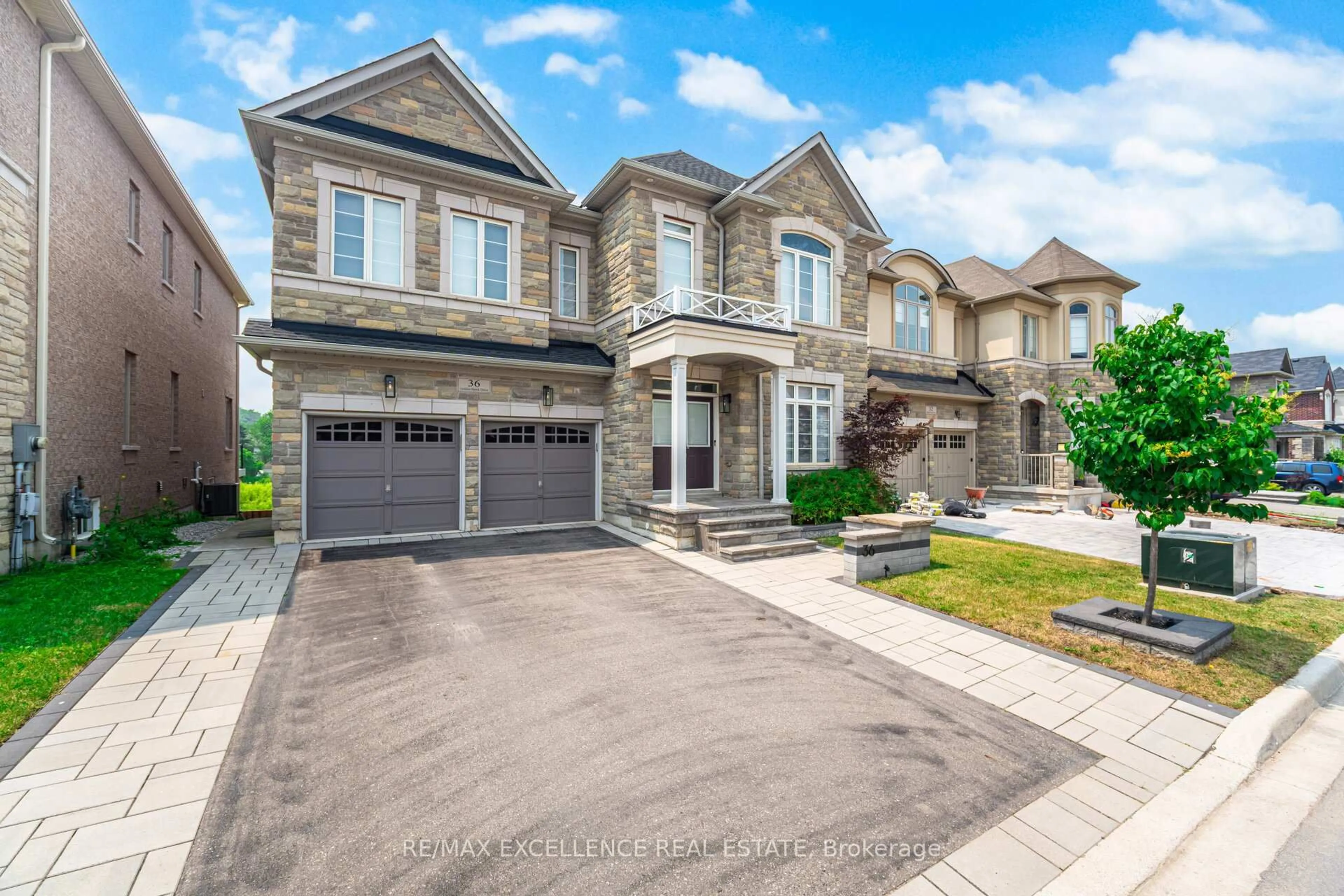 Home with brick exterior material, street for 36 Golden Hawk Dr, Hamilton Ontario L8B 1W8