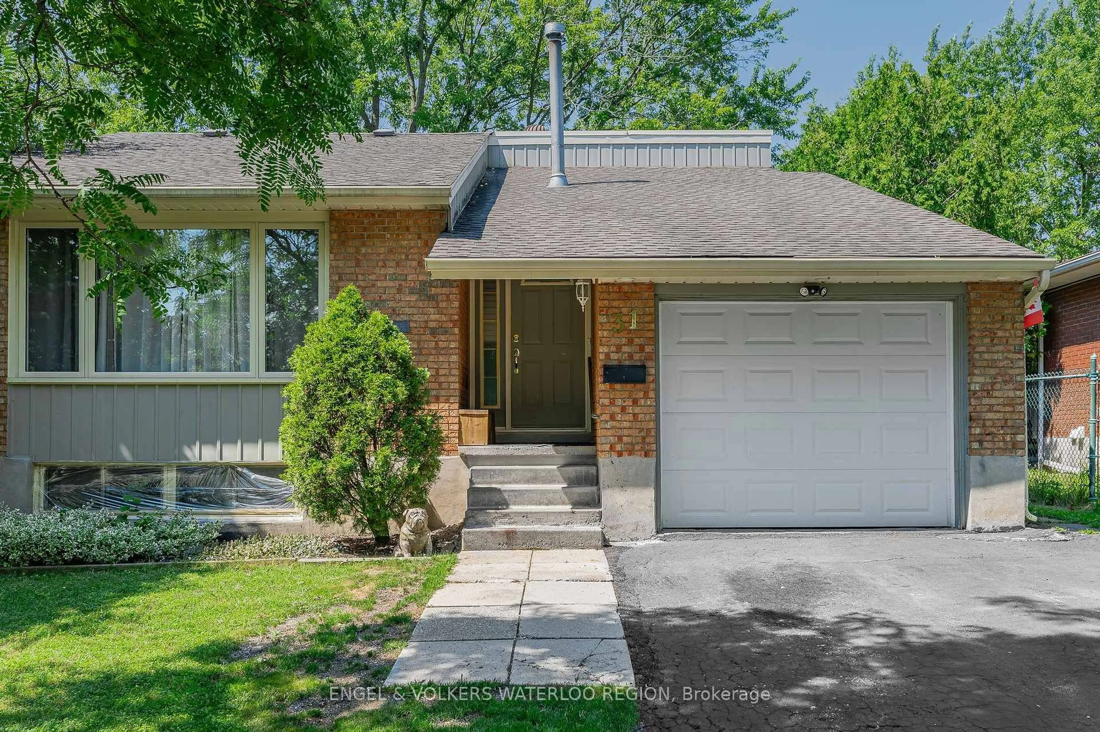 Home with brick exterior material, street for 31 Mulberry Lane, Waterloo Ontario N2L 5L4