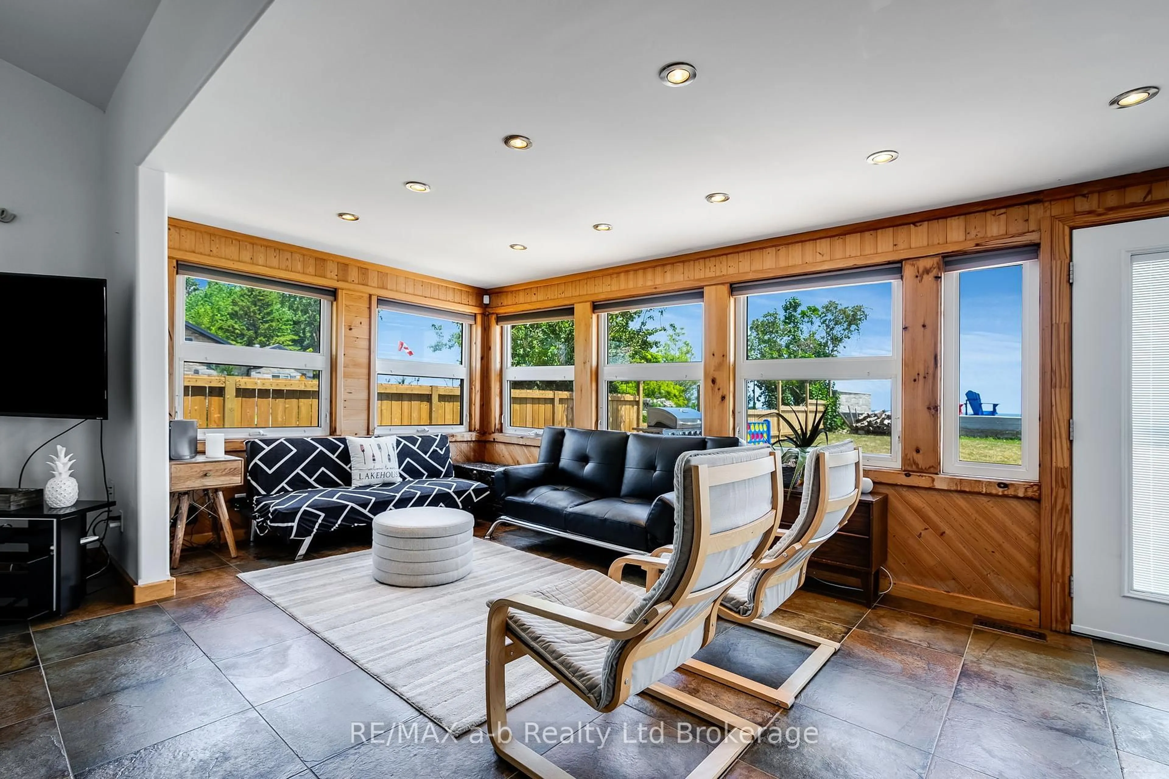 Living room with furniture, unknown for 51 Marentette Beach Rd, Leamington Ontario N8H 3V7
