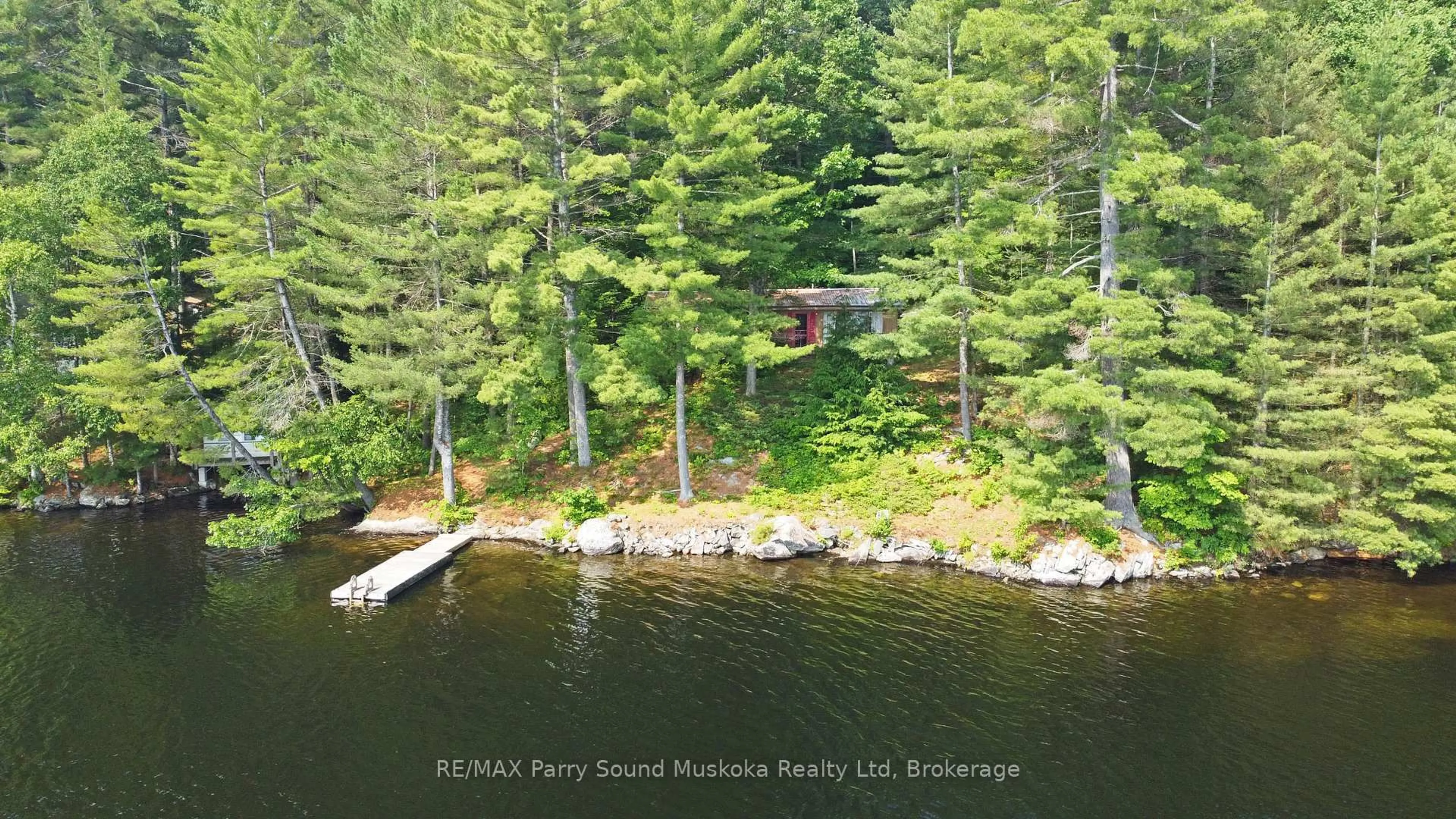 A pic from outside/outdoor area/front of a property/back of a property/a pic from drone, water/lake/river/ocean view for 27 Cooks Cove Rd, McDougall Ontario P2A 2W7
