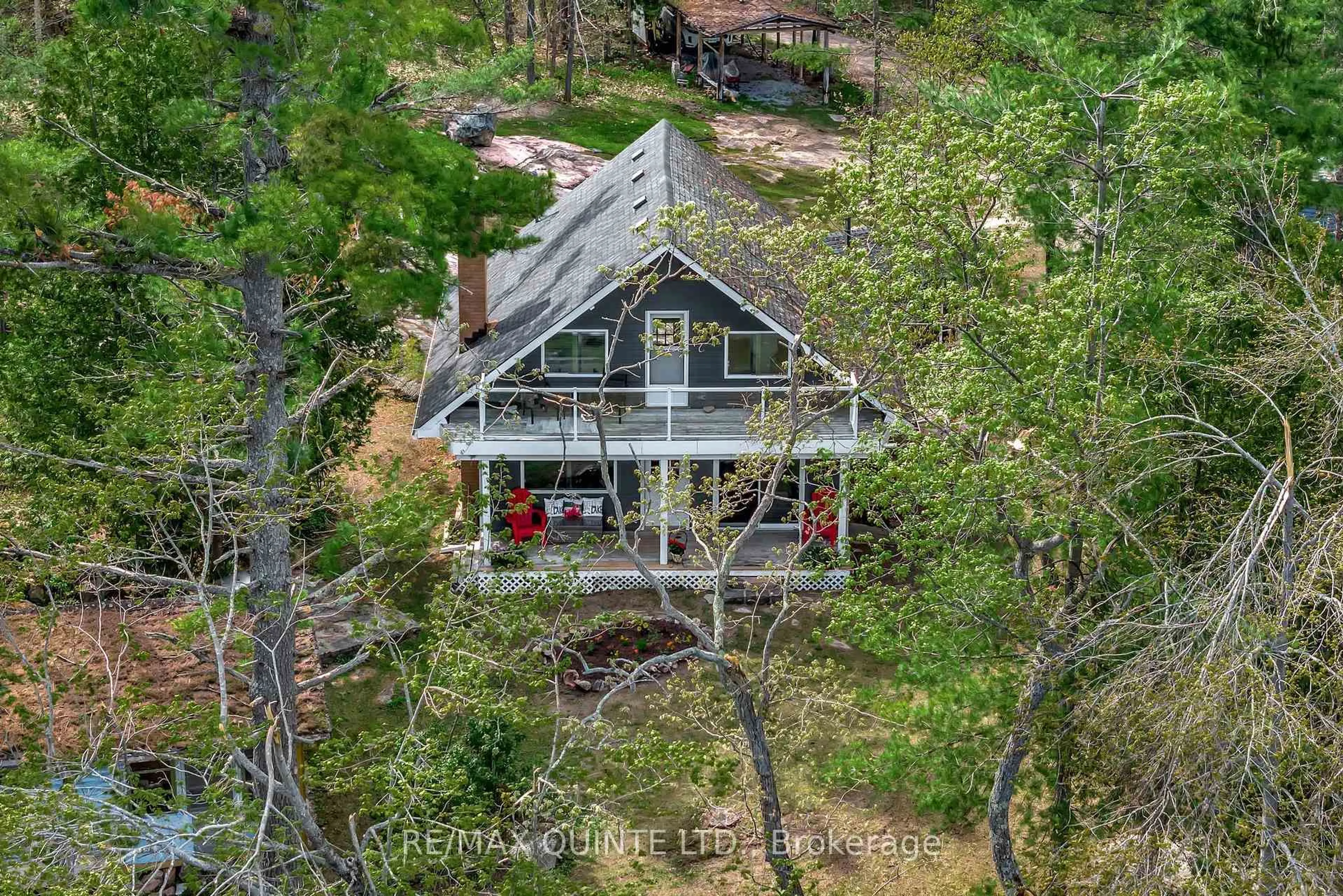 A pic from outside/outdoor area/front of a property/back of a property/a pic from drone, forest/trees view for 2 Fire Route 2 Rte, Trent Lakes Ontario K0L 1J0