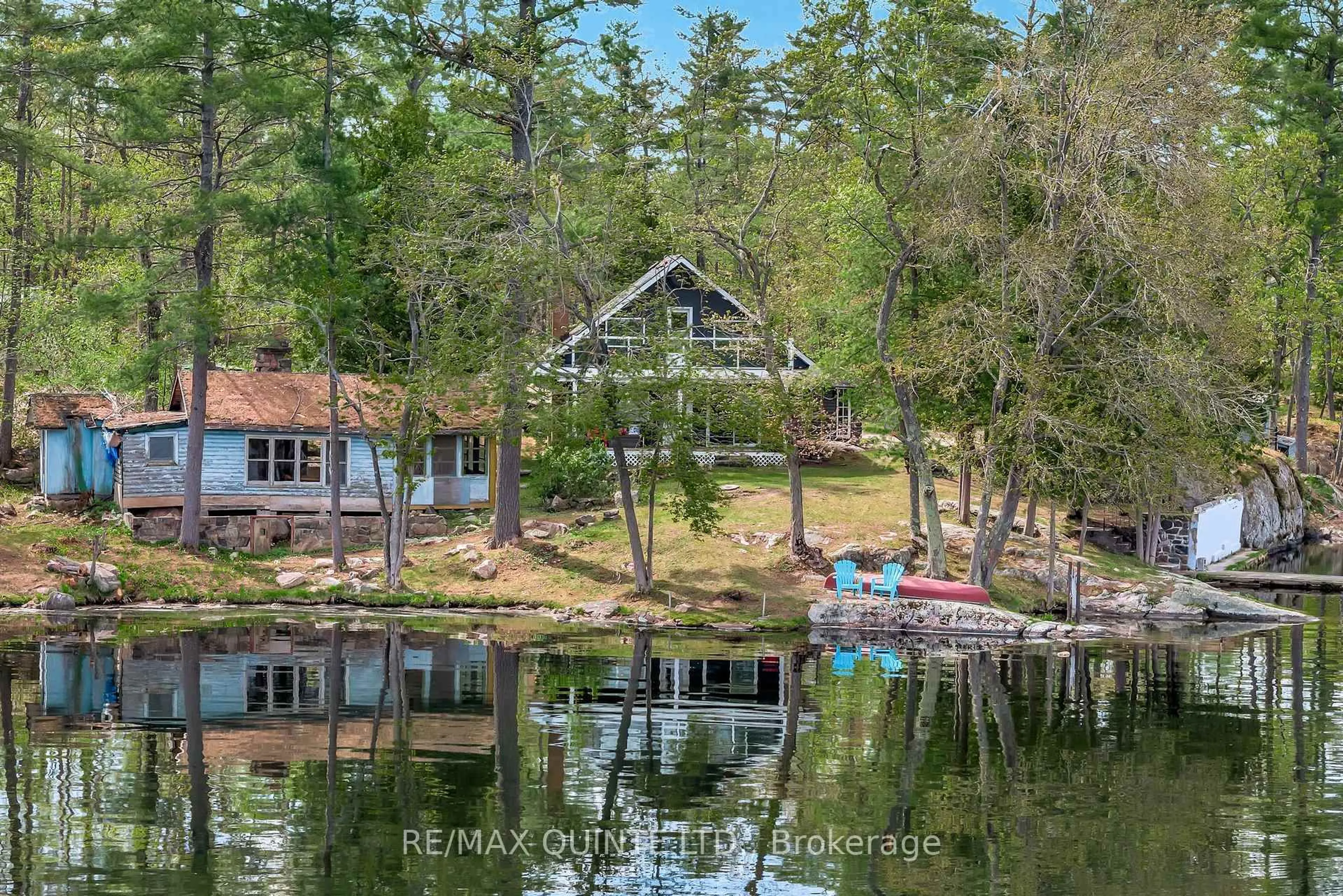 A pic from outside/outdoor area/front of a property/back of a property/a pic from drone, water/lake/river/ocean view for 2 Fire Route 2 Rte, Trent Lakes Ontario K0L 1J0