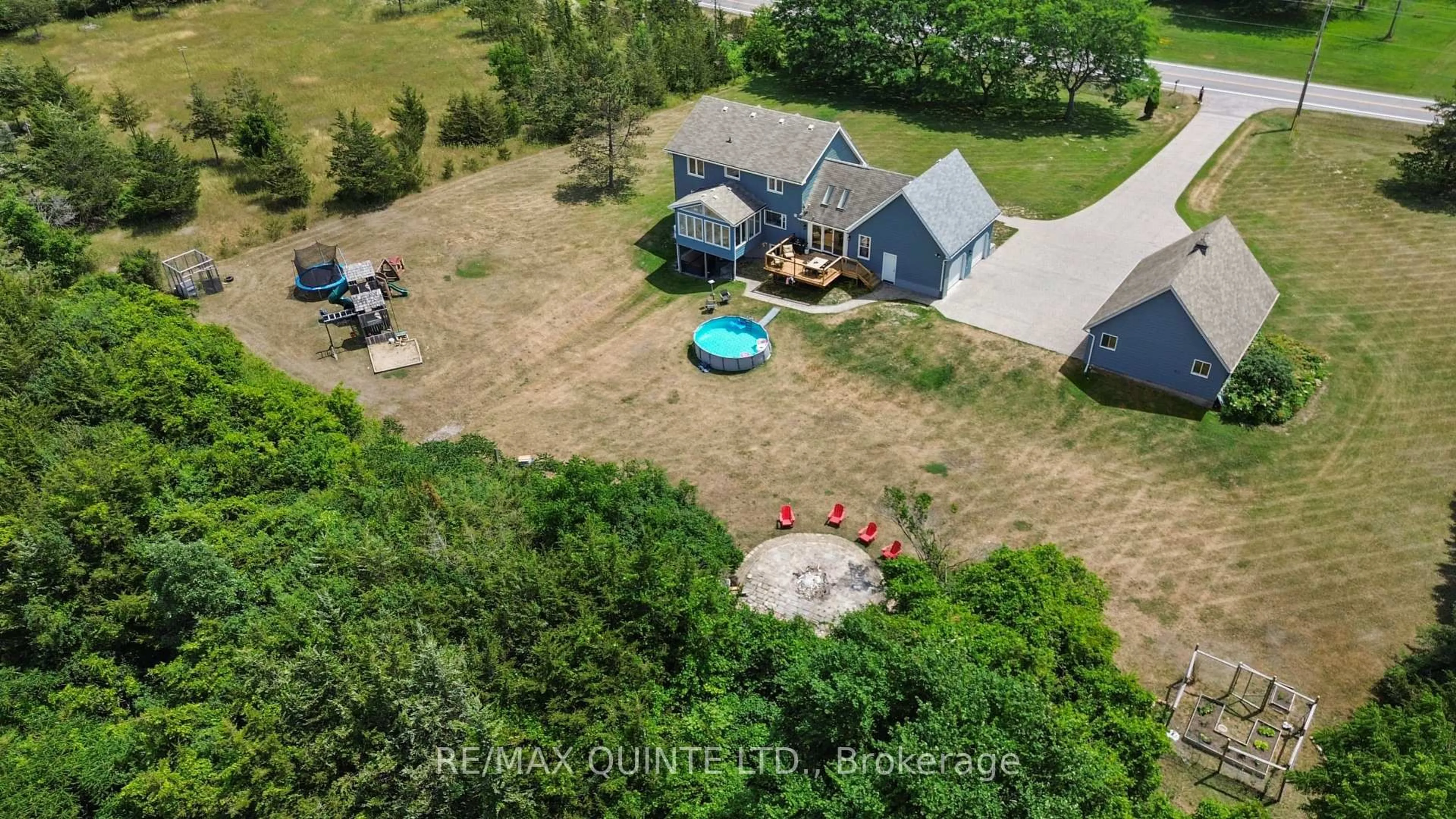 A pic from outside/outdoor area/front of a property/back of a property/a pic from drone, unknown for 3130 County Rd 3, Prince Edward County Ontario K0K 1L0