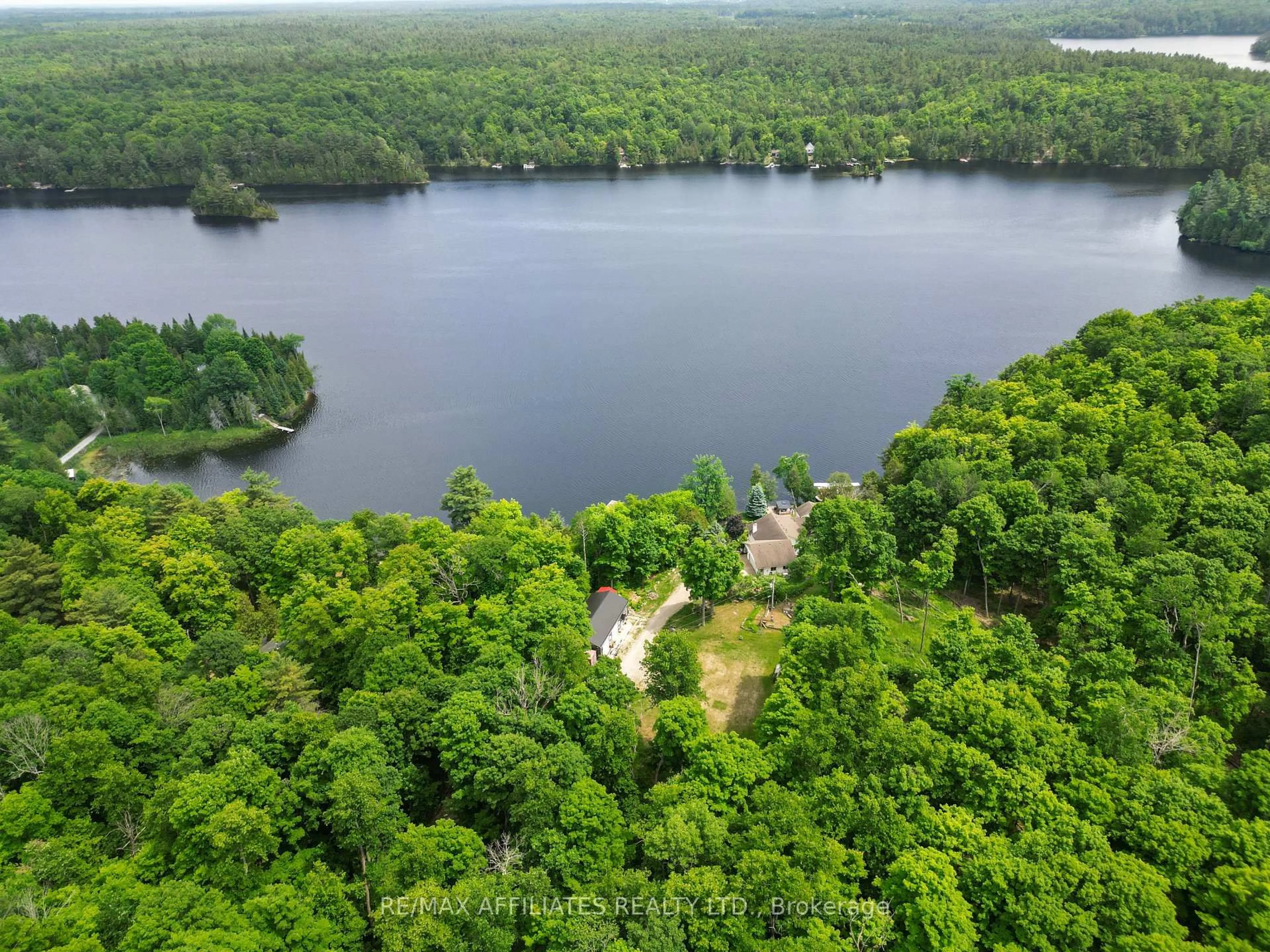 A pic from outside/outdoor area/front of a property/back of a property/a pic from drone, water/lake/river/ocean view for 101 Arthur Rd, Maberly Ontario K0H 2B0