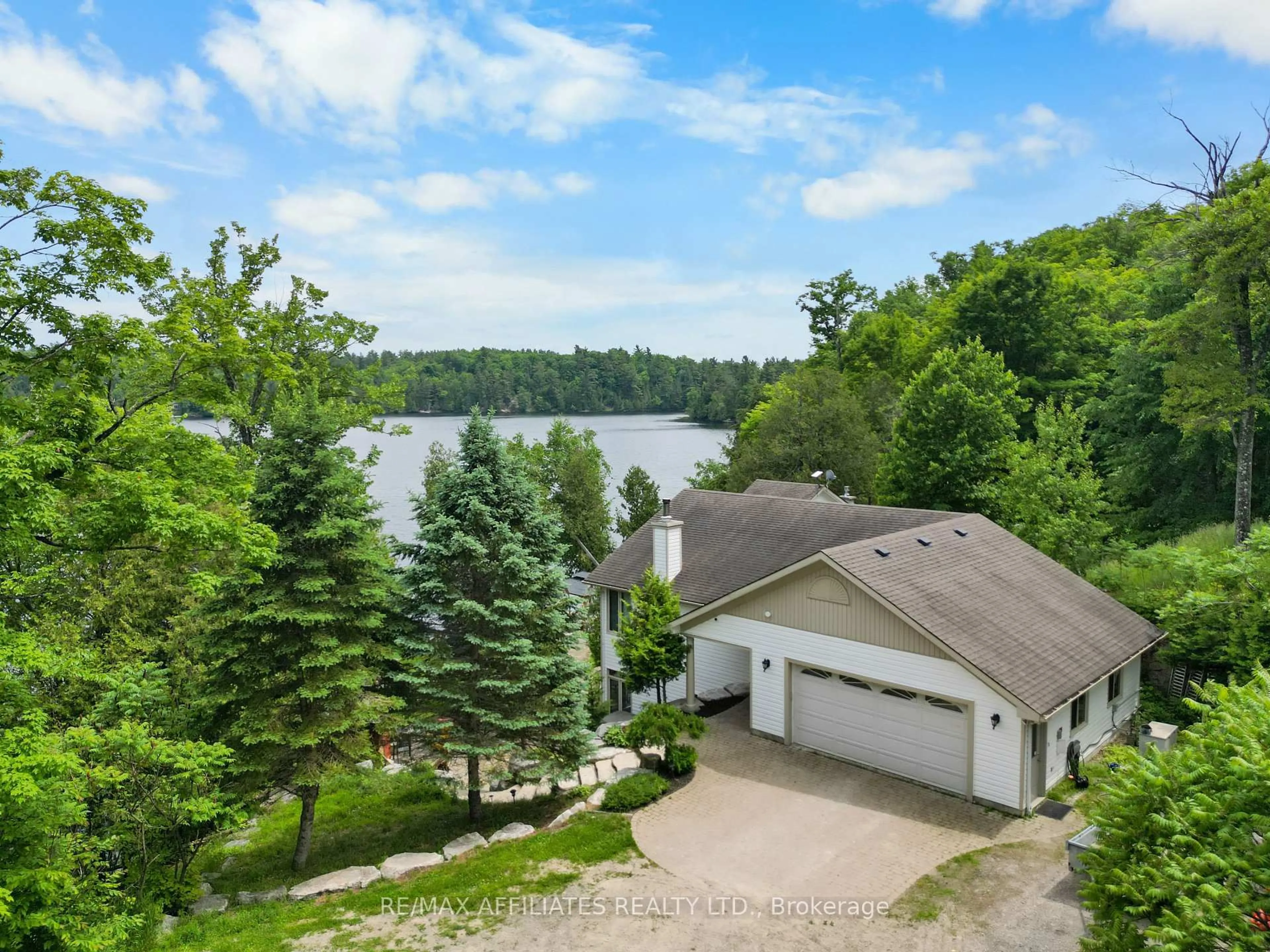A pic from outside/outdoor area/front of a property/back of a property/a pic from drone, water/lake/river/ocean view for 101 Arthur Rd, Maberly Ontario K0H 2B0