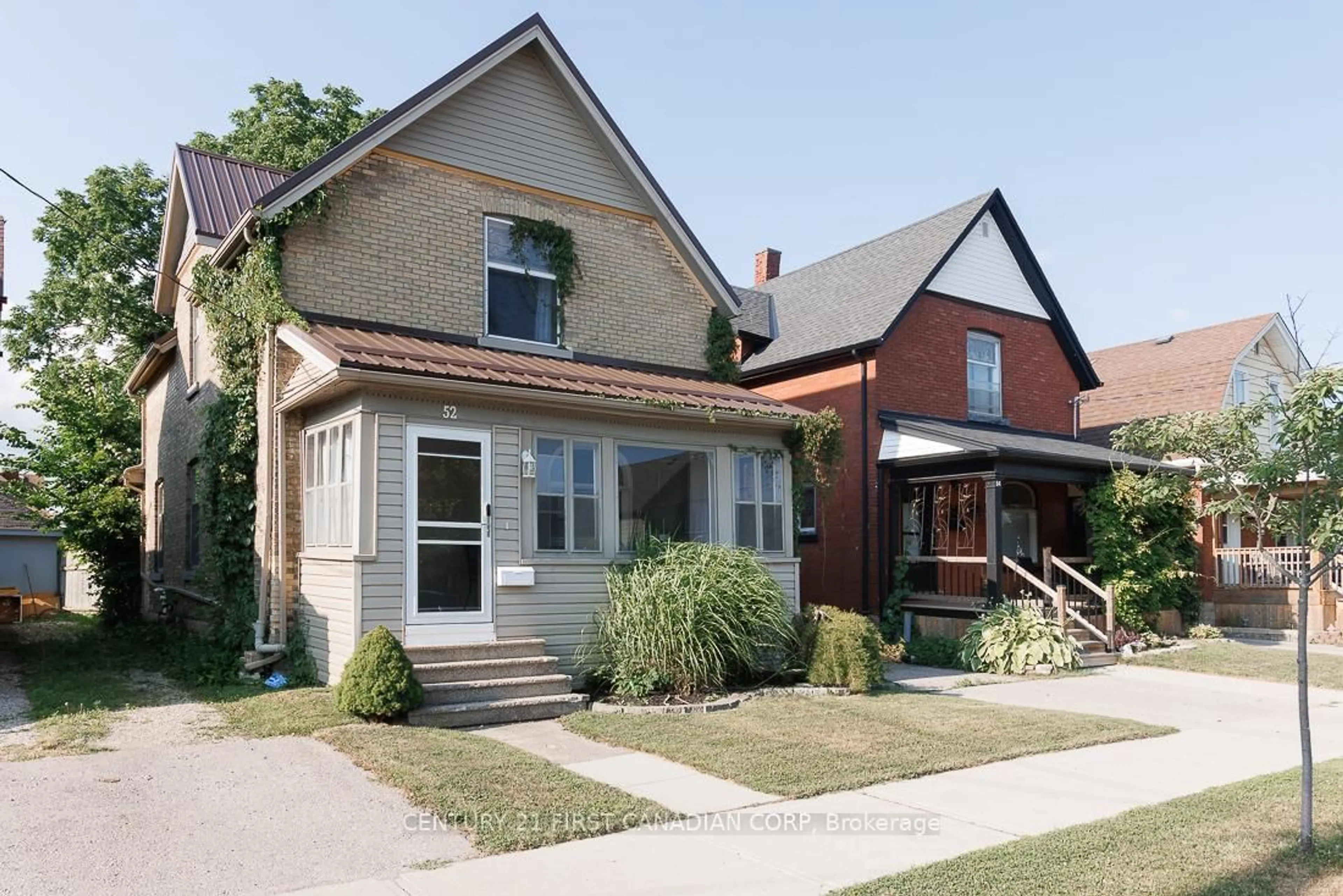 Home with brick exterior material, street for 52 Myrtle St, St. Thomas Ontario N5R 2E8