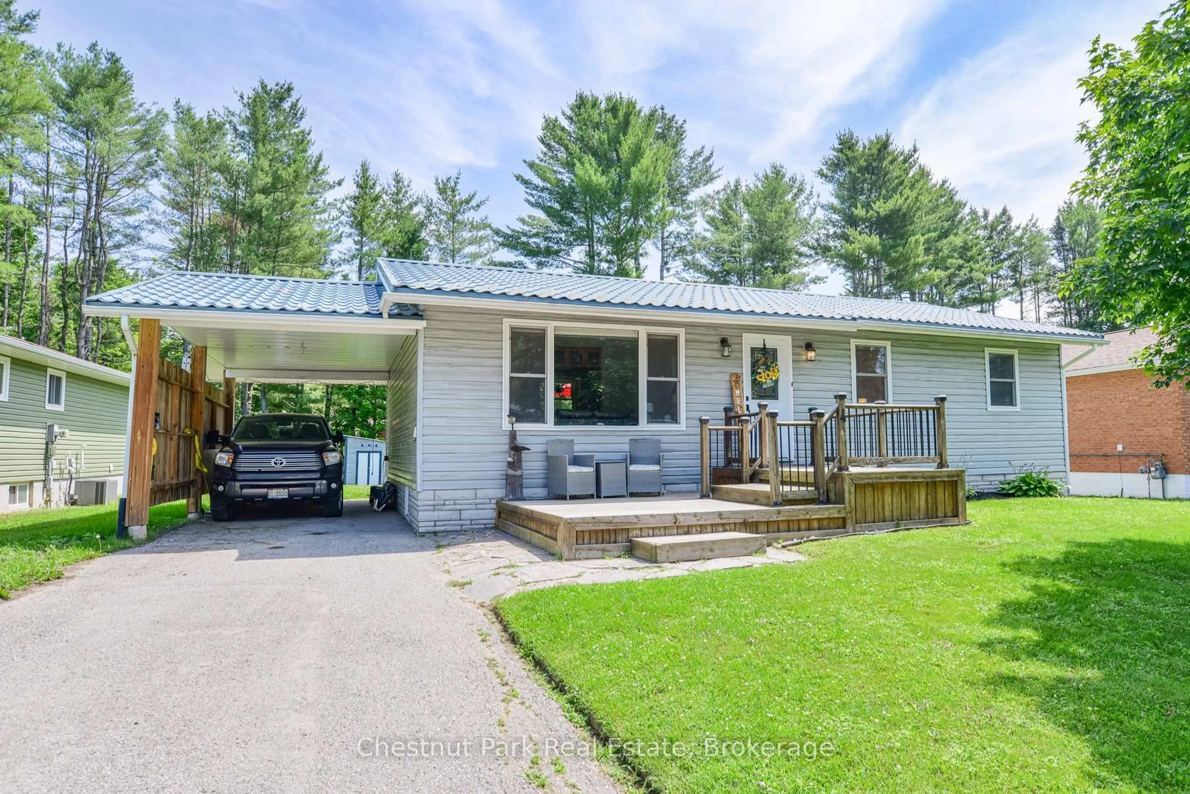 Home with vinyl exterior material, street for 4 Pinewood Dr, Bracebridge Ontario P1L 1K8