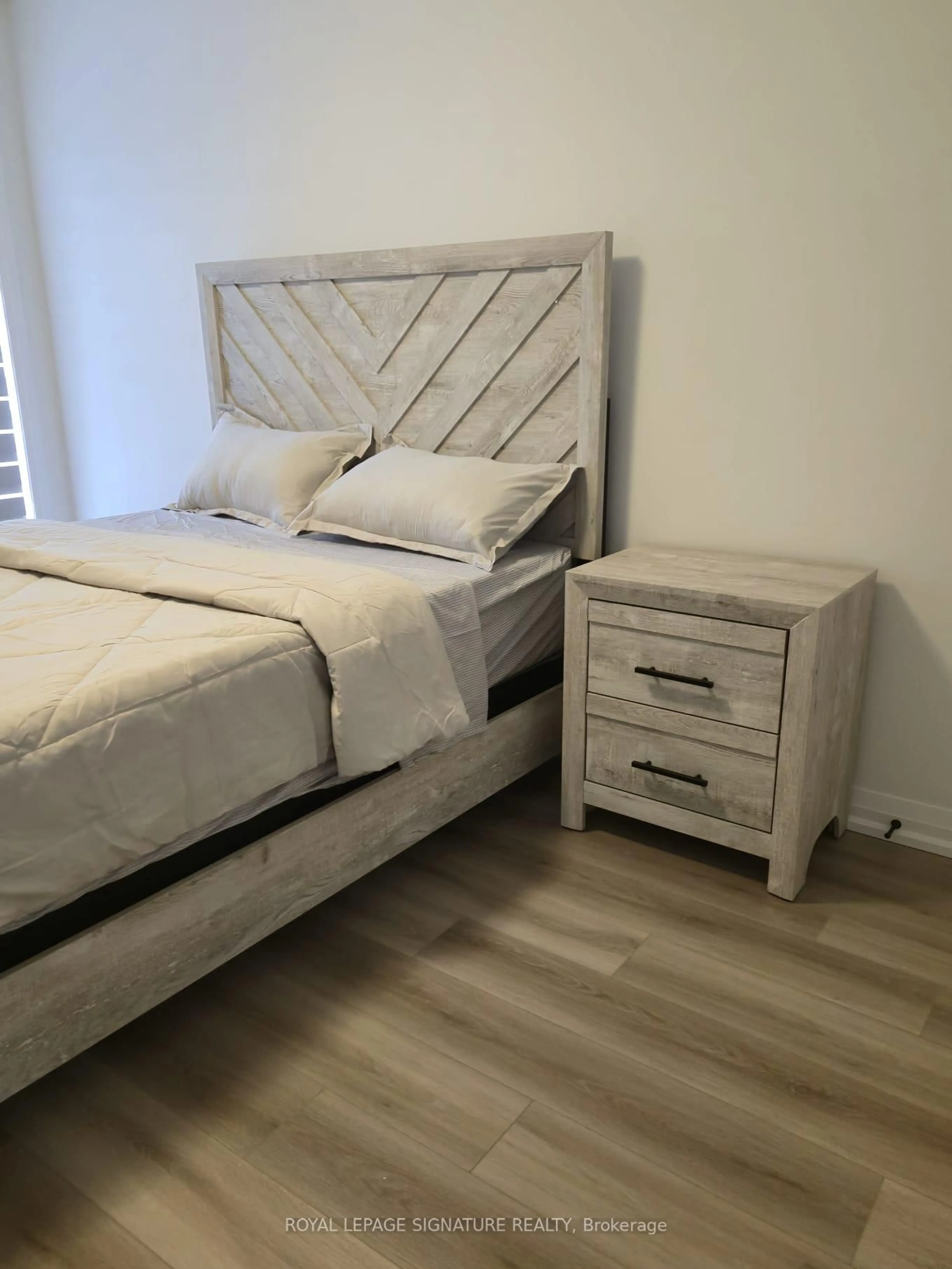 Bedroom with bed, wood/laminate floor for 55 Tom Brown Dr, Brant Ontario N3L 0N5