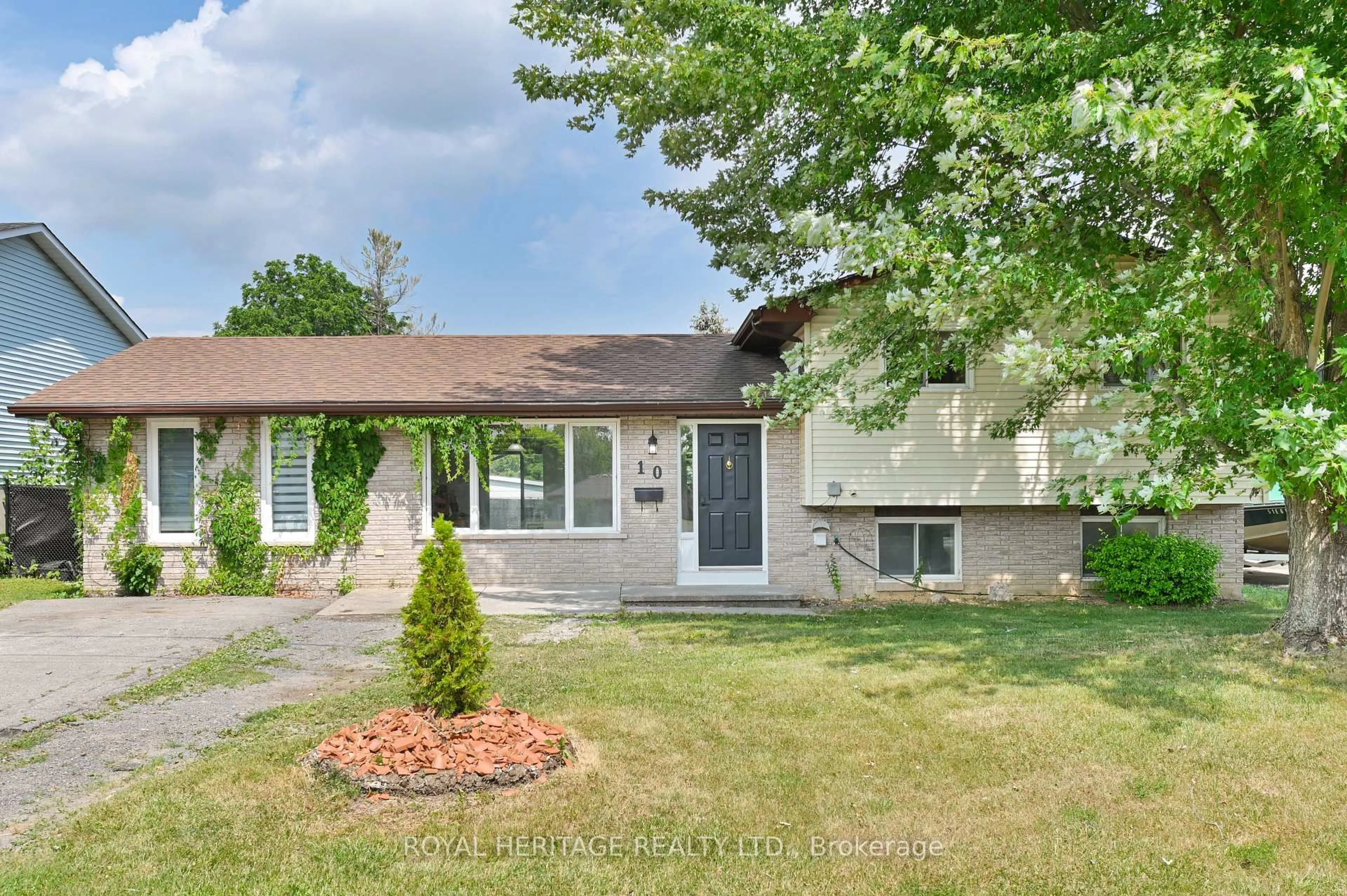 Home with vinyl exterior material, street for 10 Reid St, Greater Napanee Ontario K7R 3V2