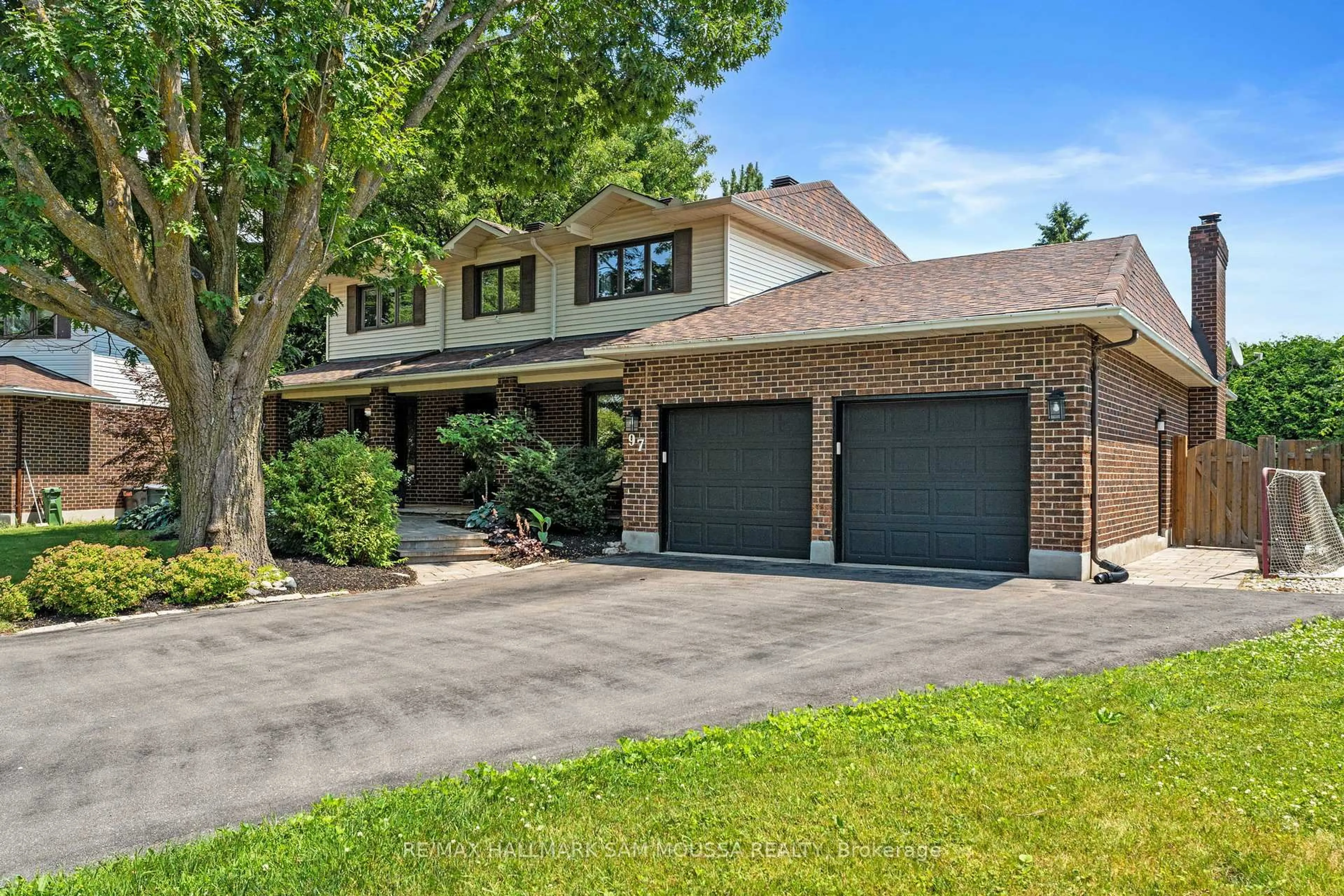Home with brick exterior material, street for 97 Thare Cres, Ottawa Ontario K2J 2J1