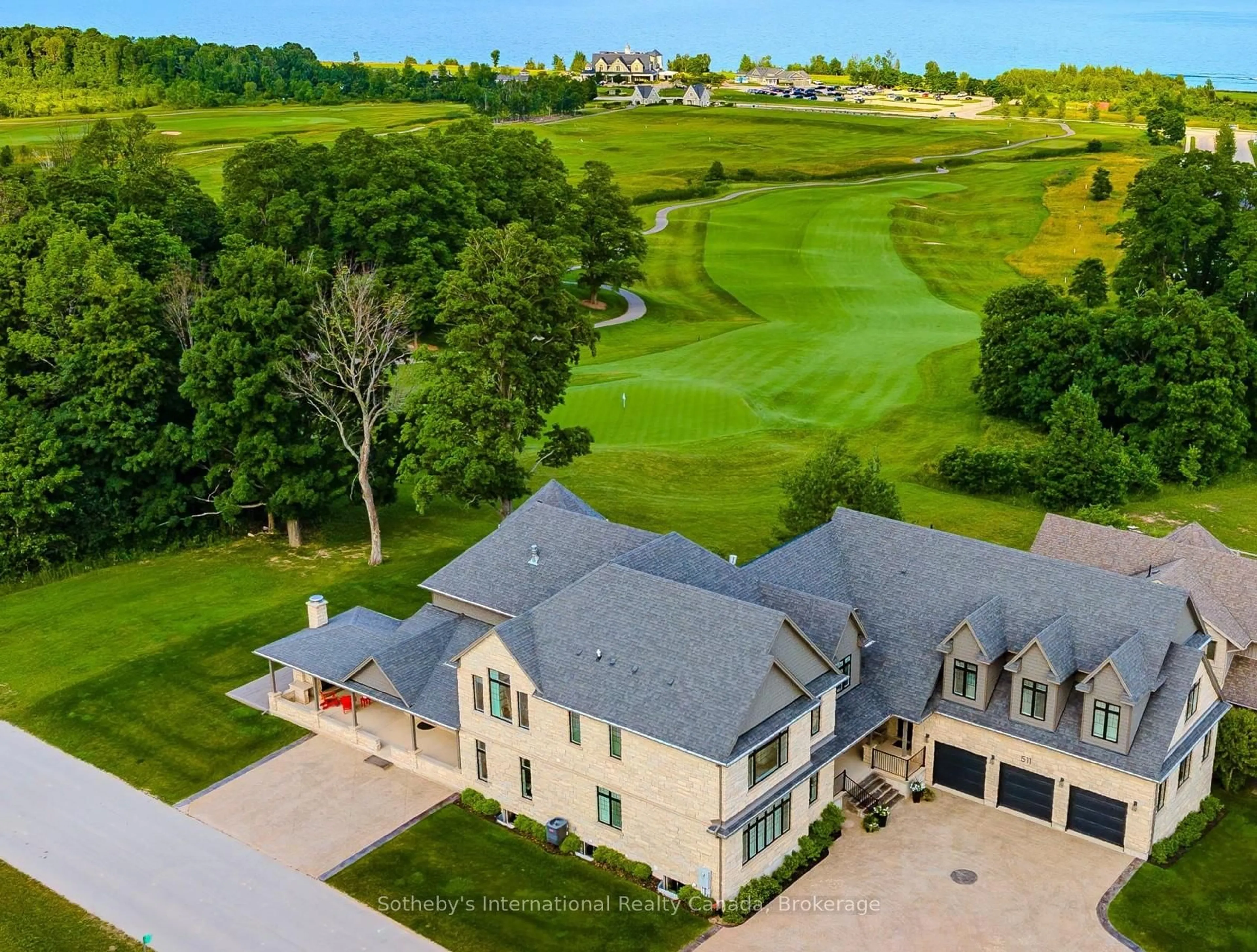 A pic from outside/outdoor area/front of a property/back of a property/a pic from drone, unknown for 511 Algonquin Tr, Georgian Bluffs Ontario N0H 1S0