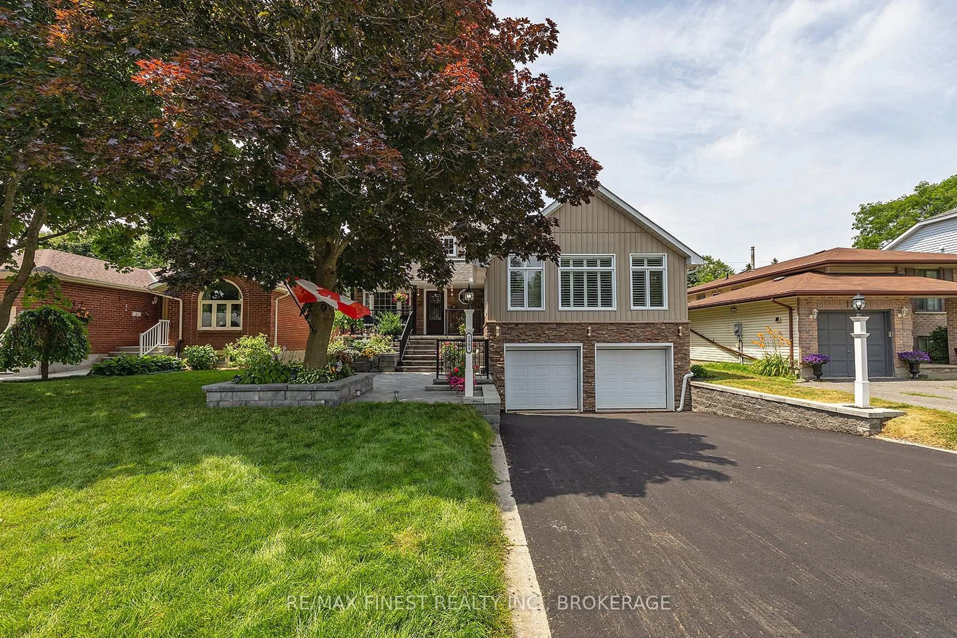 Home with brick exterior material, street for 1303 Rockwood Dr, Kingston Ontario K7P 1X6