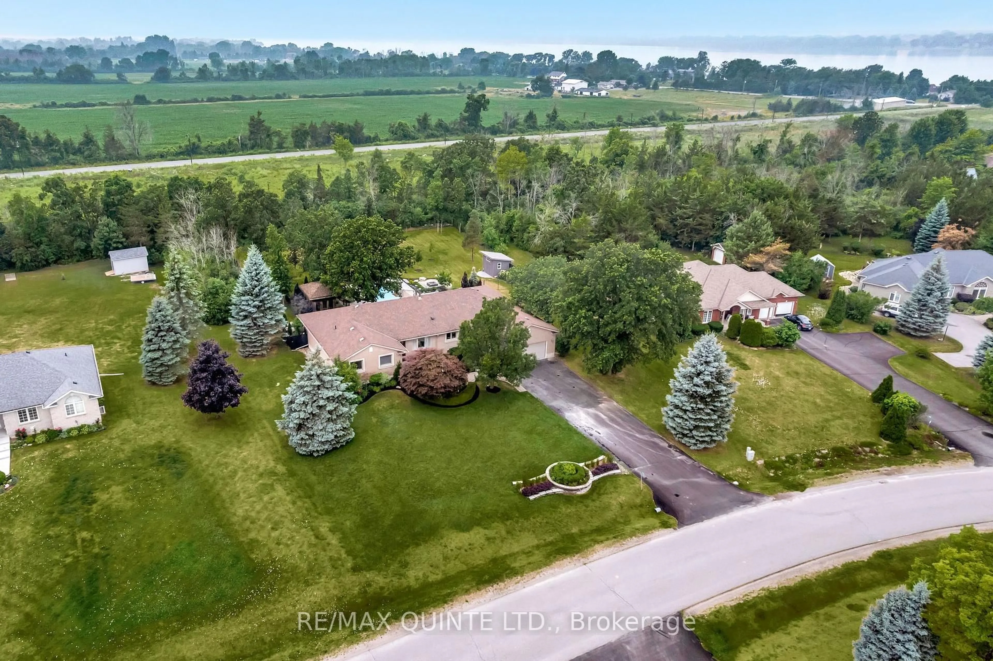 A pic from outside/outdoor area/front of a property/back of a property/a pic from drone, unknown for 100 Bay Breeze St, Prince Edward County Ontario K8N 0L4