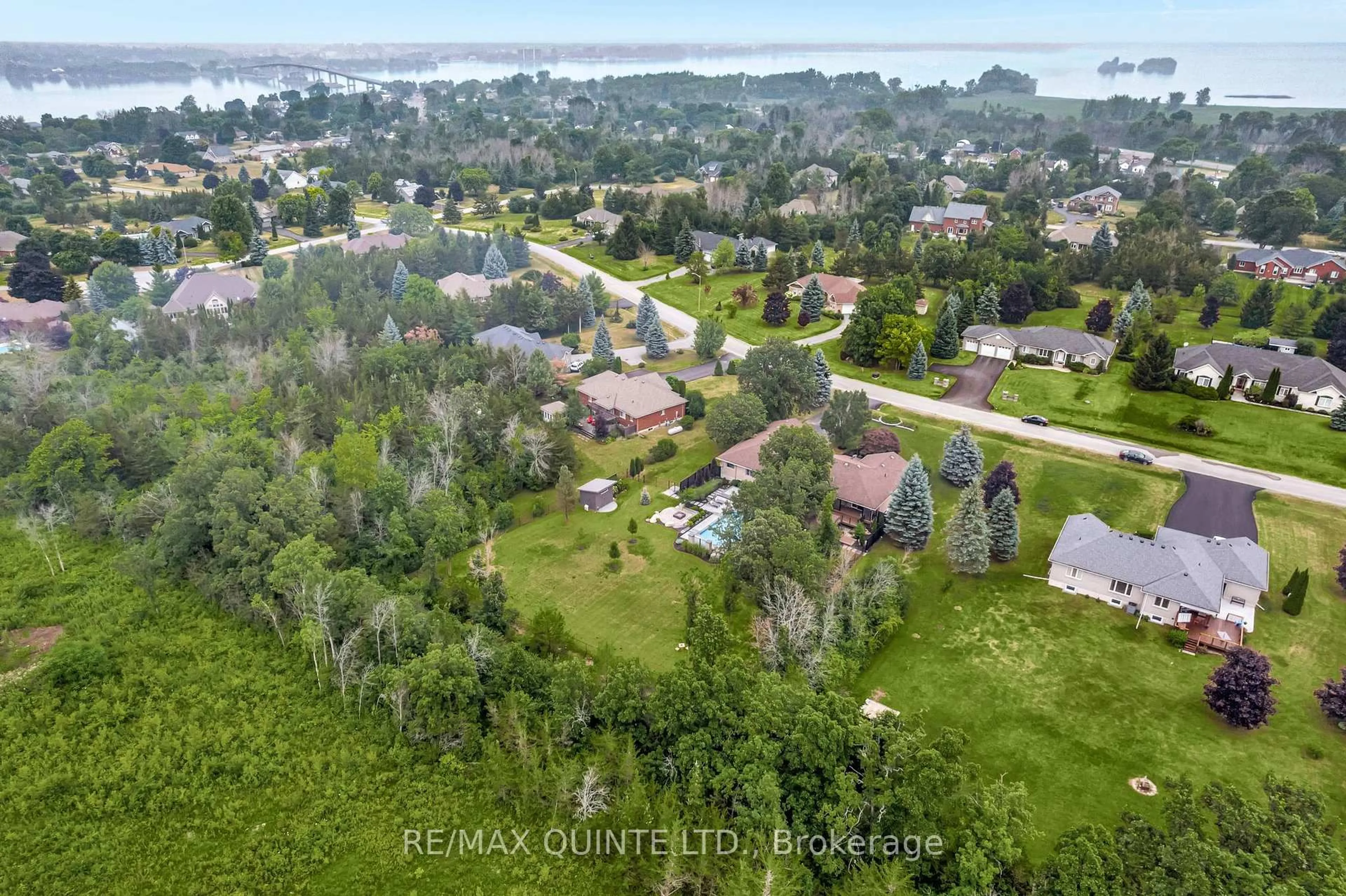 A pic from outside/outdoor area/front of a property/back of a property/a pic from drone, water/lake/river/ocean view for 100 Bay Breeze St, Prince Edward County Ontario K8N 0L4