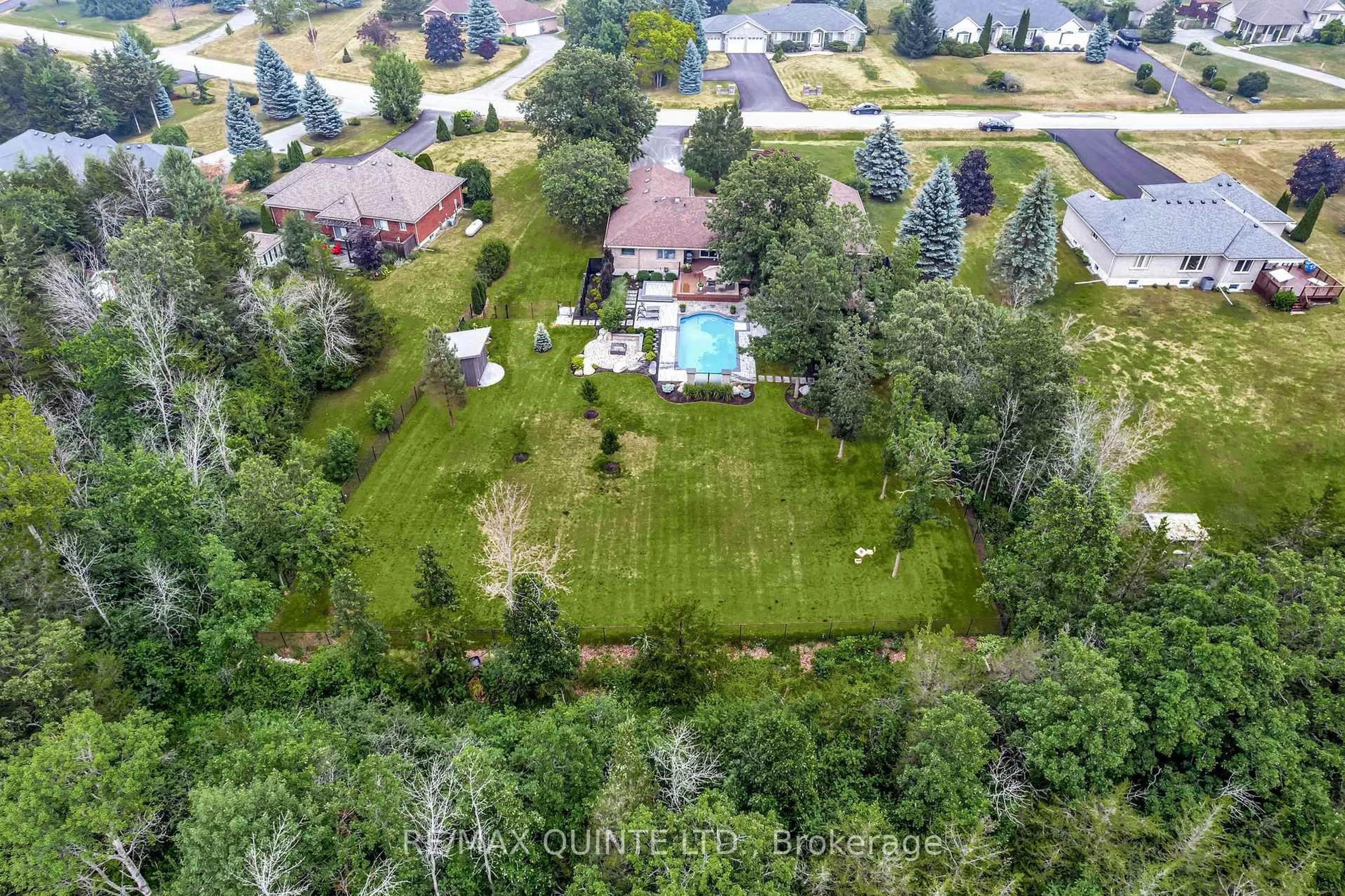 A pic from outside/outdoor area/front of a property/back of a property/a pic from drone, unknown for 100 Bay Breeze St, Prince Edward County Ontario K8N 0L4