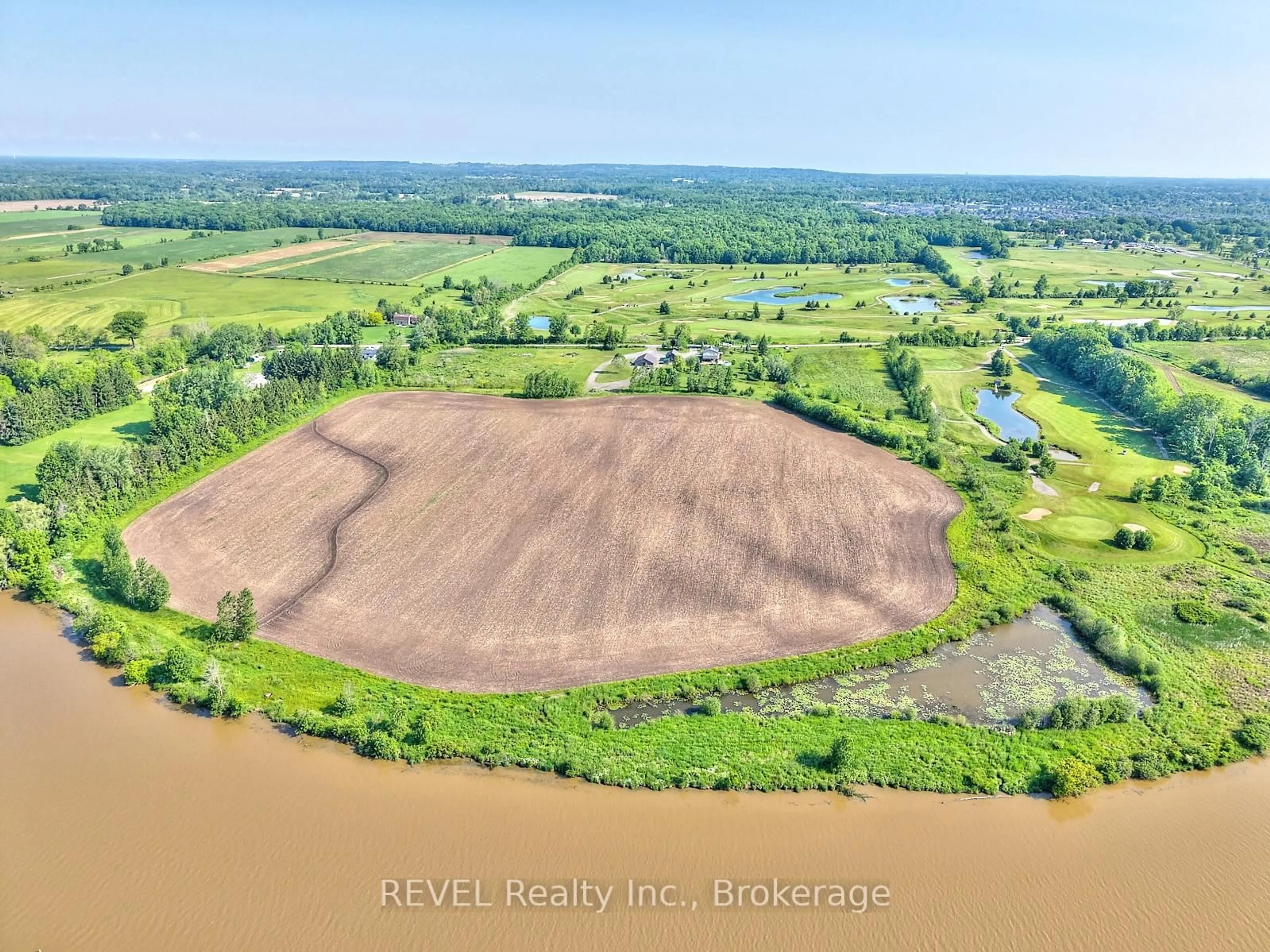 A pic from outside/outdoor area/front of a property/back of a property/a pic from drone, water/lake/river/ocean view for 118 River Rd, Pelham Ontario L0S 1C0