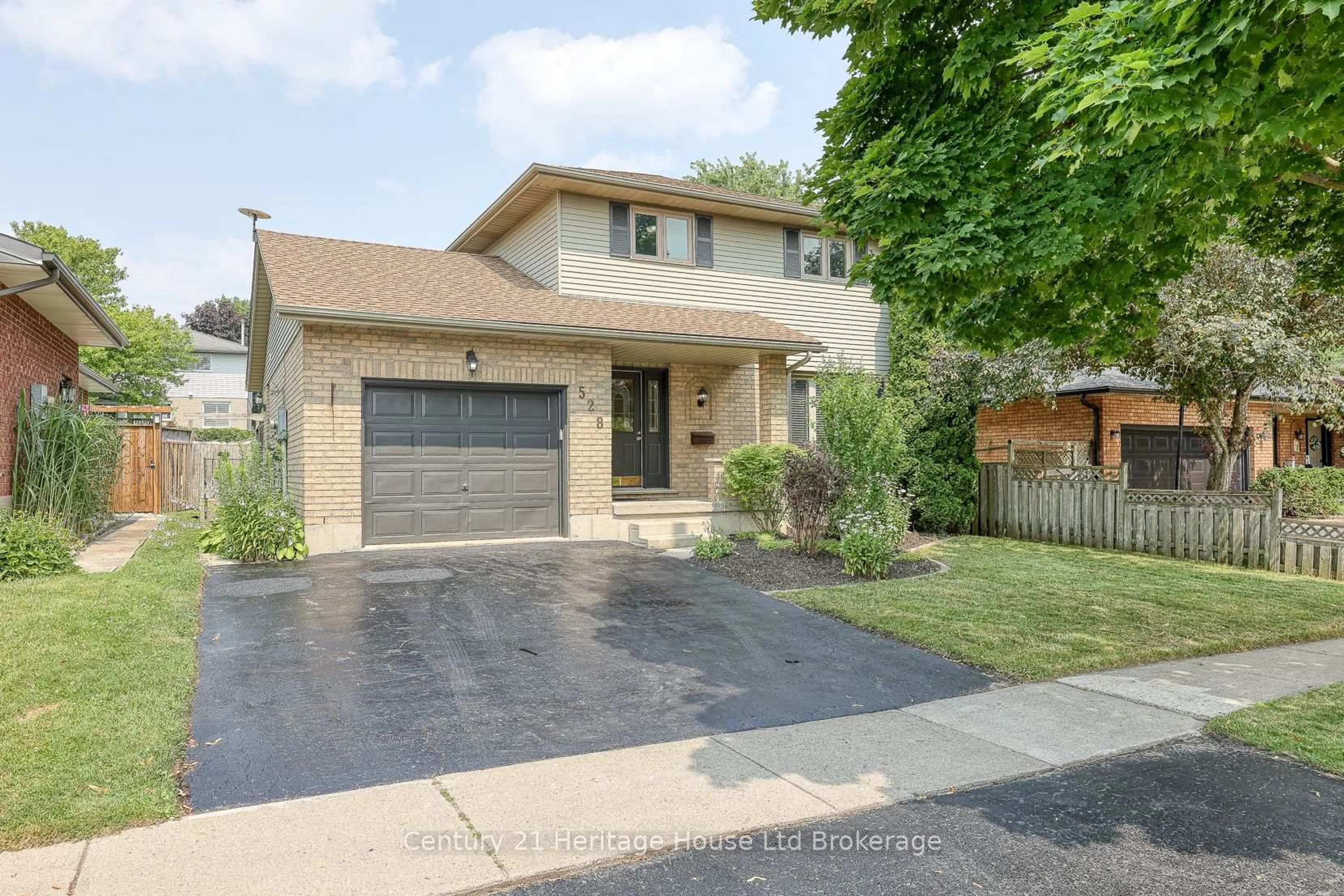 Home with brick exterior material, street for 528 Springbank Ave, Woodstock Ontario N4T 1H3