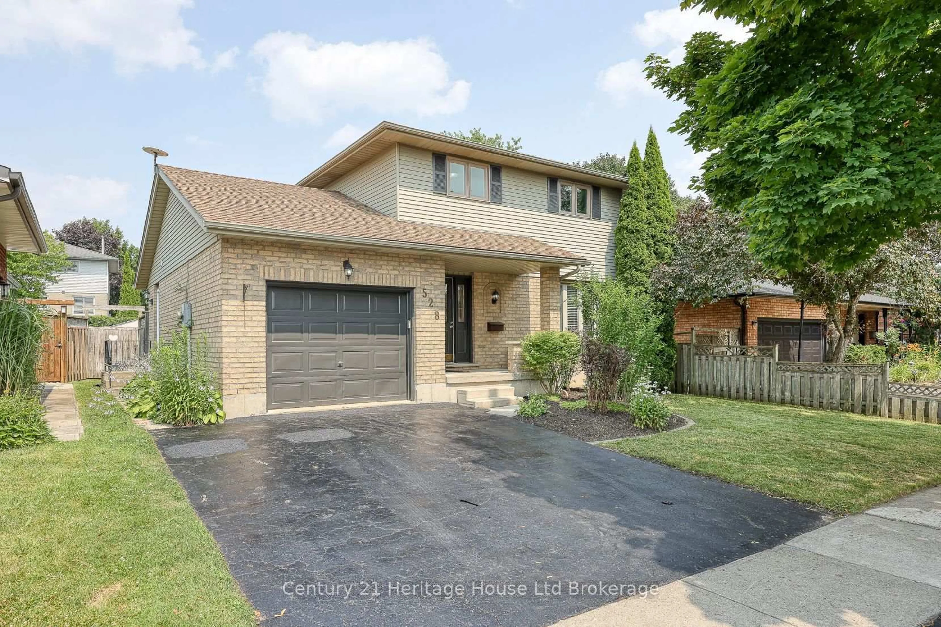 Home with brick exterior material, street for 528 Springbank Ave, Woodstock Ontario N4T 1H3