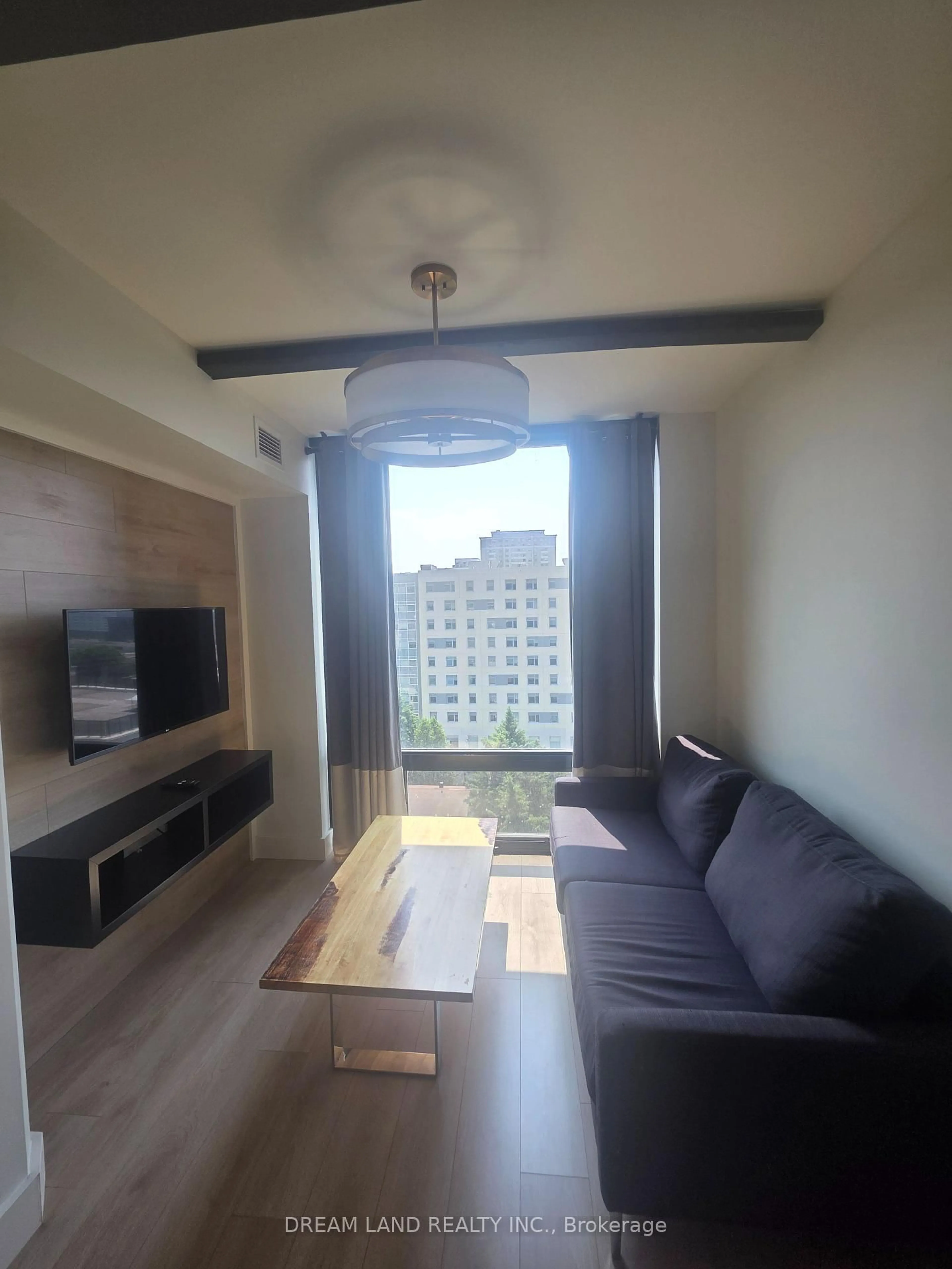 Living room with furniture, wood/laminate floor for 145 Columbia St #1035, Waterloo Ontario N2L 3L2