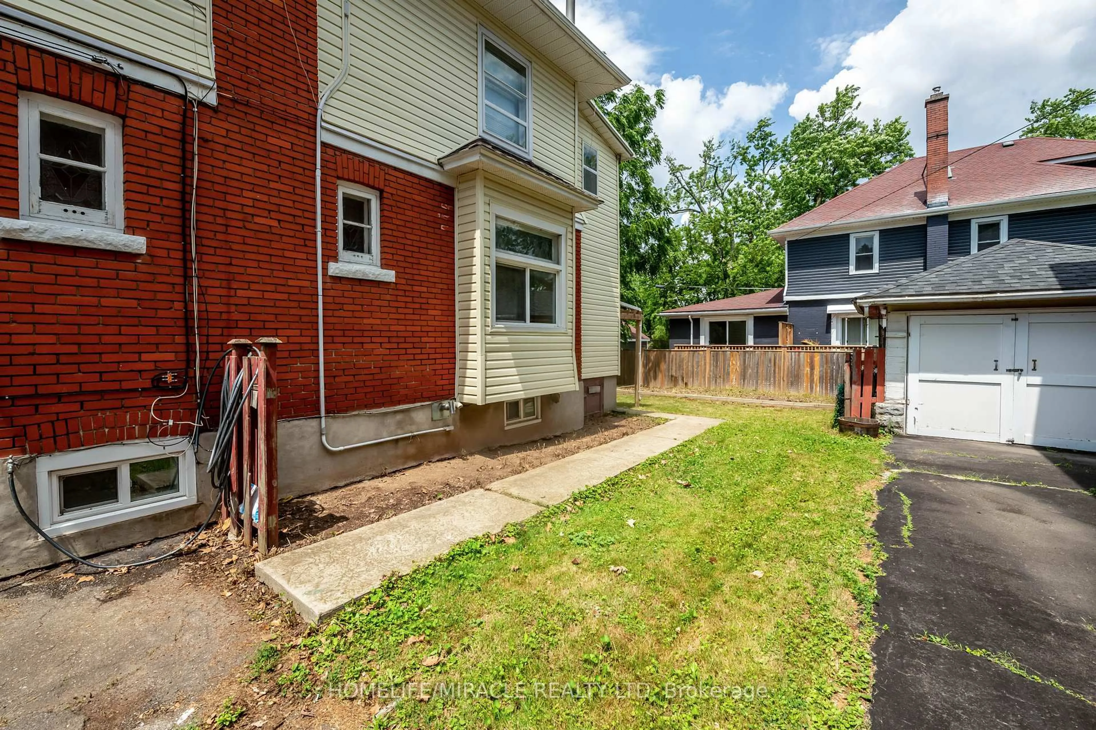 Home with brick exterior material, street for 4975 MCRAE St, Niagara Falls Ontario L2E 1P2