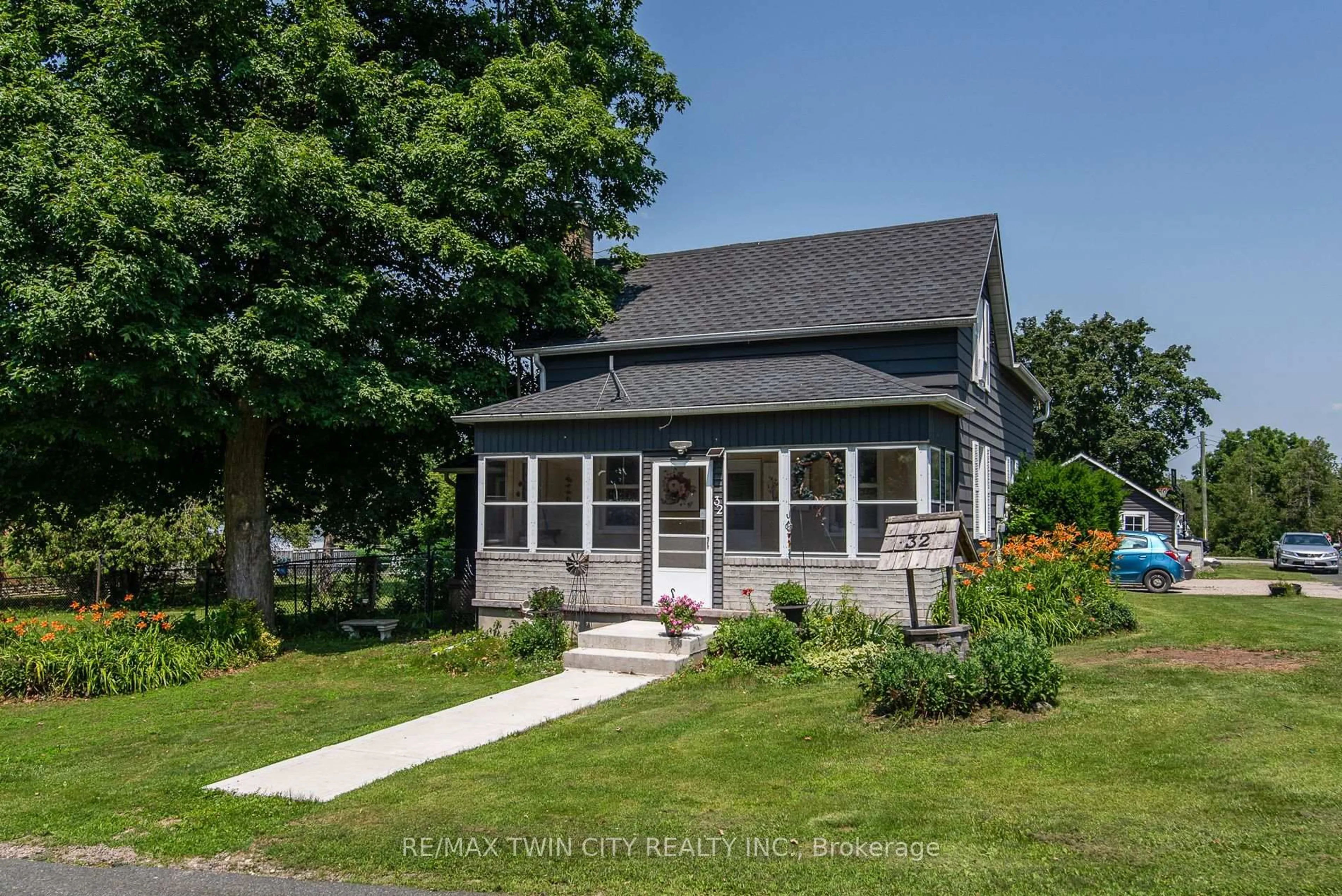 Home with vinyl exterior material, street for 32 River St, Woolwich Ontario N0B 1K0