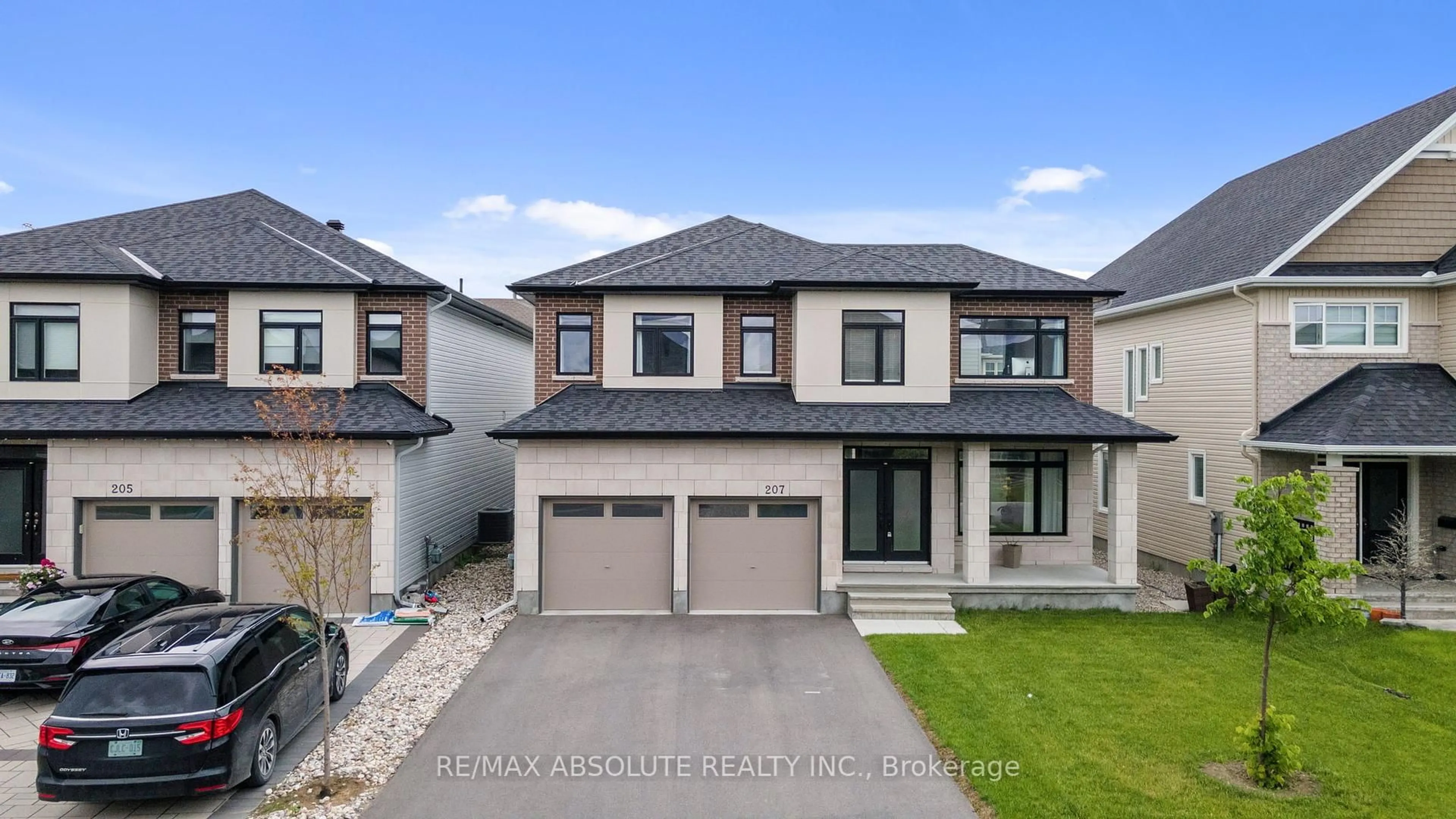 Home with brick exterior material, street for 207 Osterley Way, Ottawa Ontario K2S 2N6