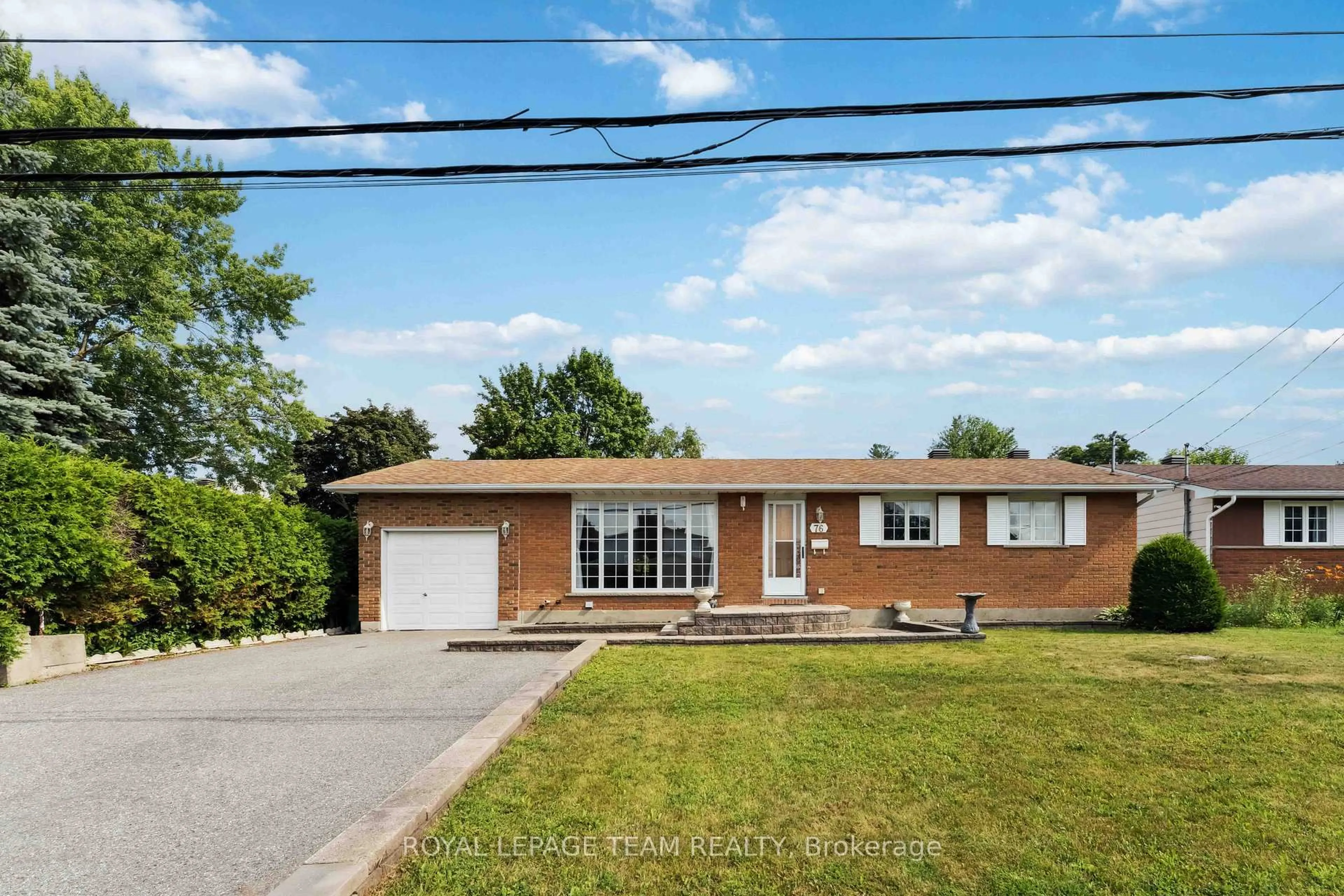 Home with brick exterior material, street for 76 Knoxdale Rd, Ottawa Ontario K2G 1A6
