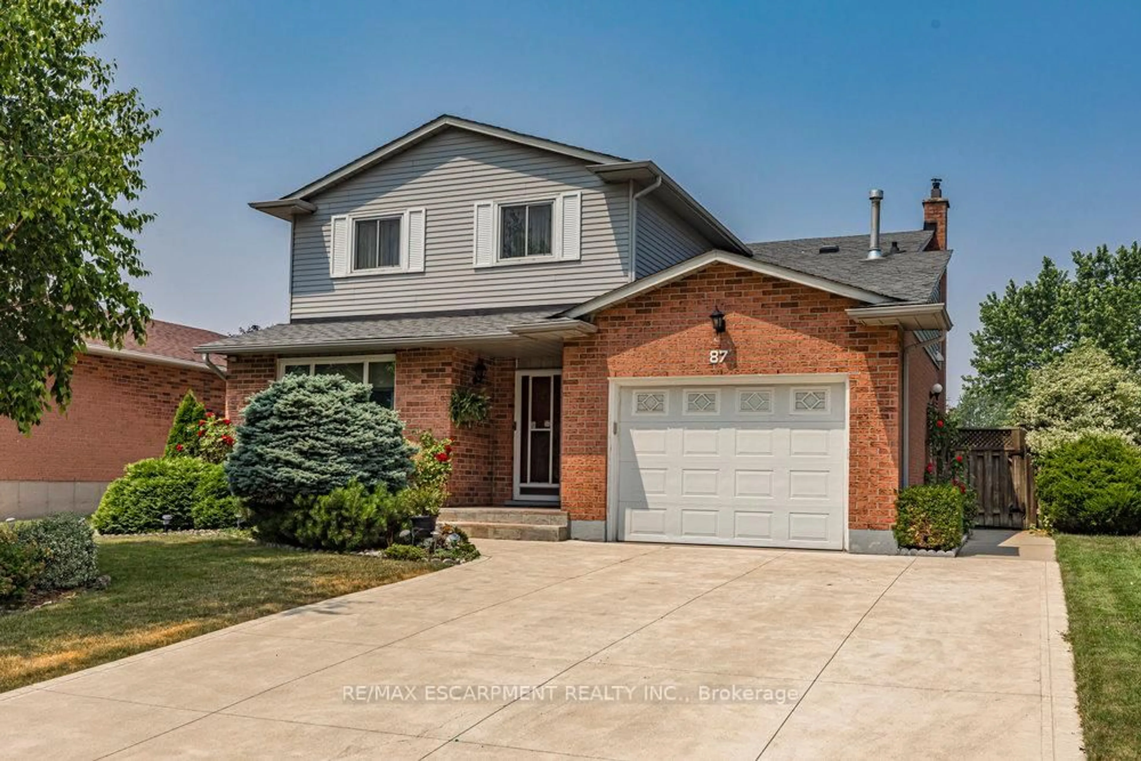 Home with brick exterior material, street for 87 Strawberry Dr, Hamilton Ontario L8E 4R3