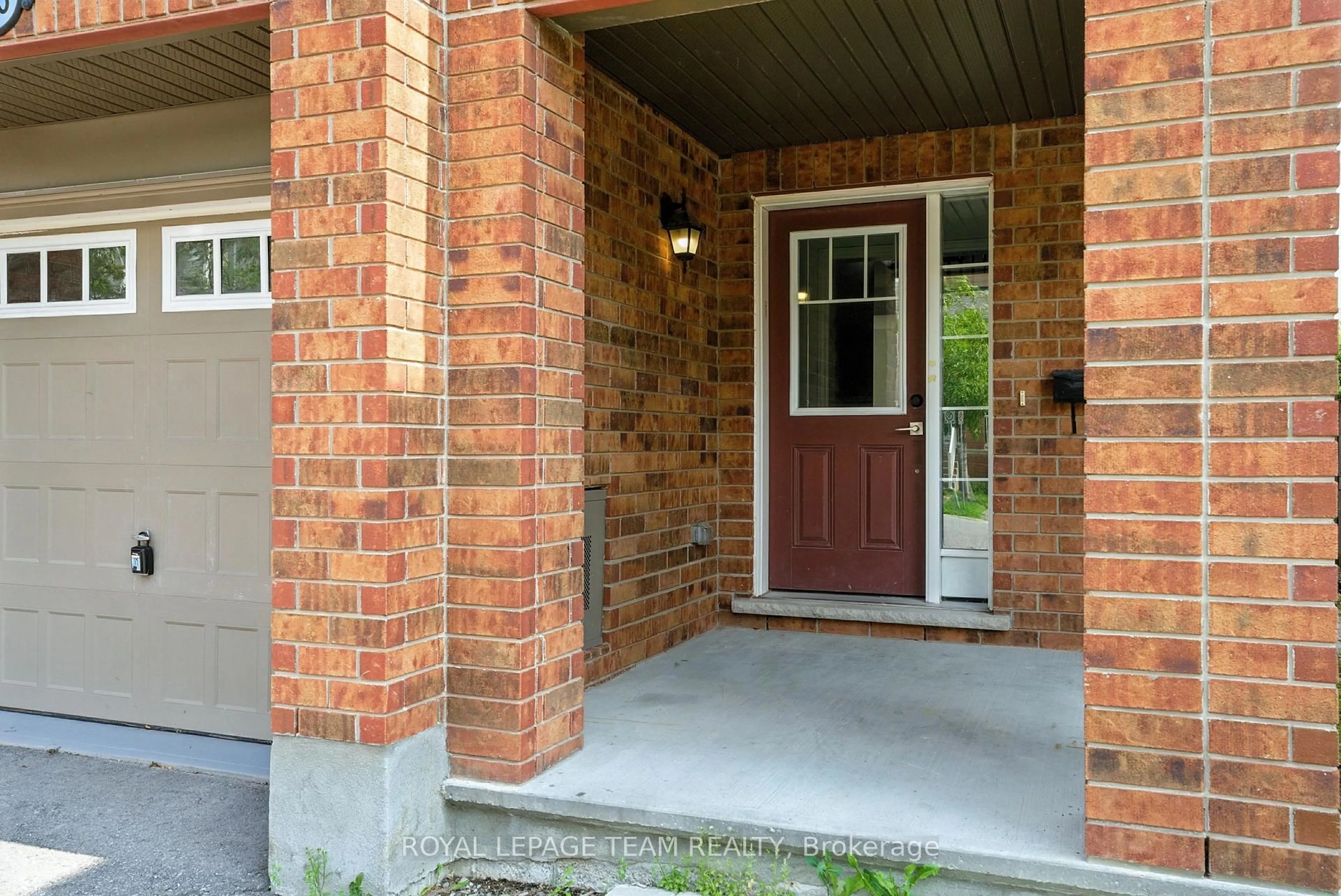Home with brick exterior material, street for 495 Coldwater Cres, Ottawa Ontario K2M 0J4