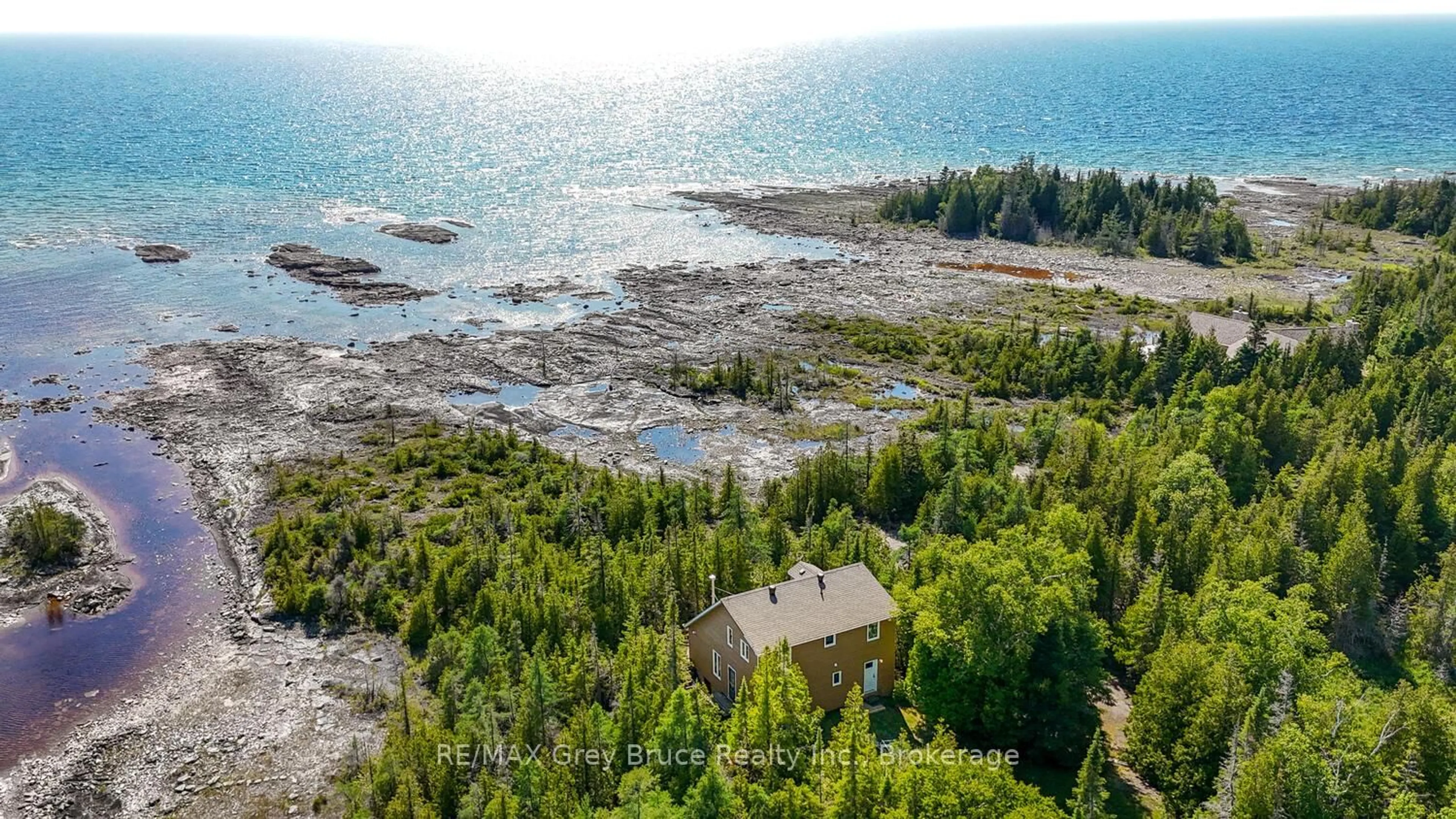 A pic from outside/outdoor area/front of a property/back of a property/a pic from drone, water/lake/river/ocean view for 159 Zorra Dr, Northern Bruce Peninsula Ontario N0H 2R0