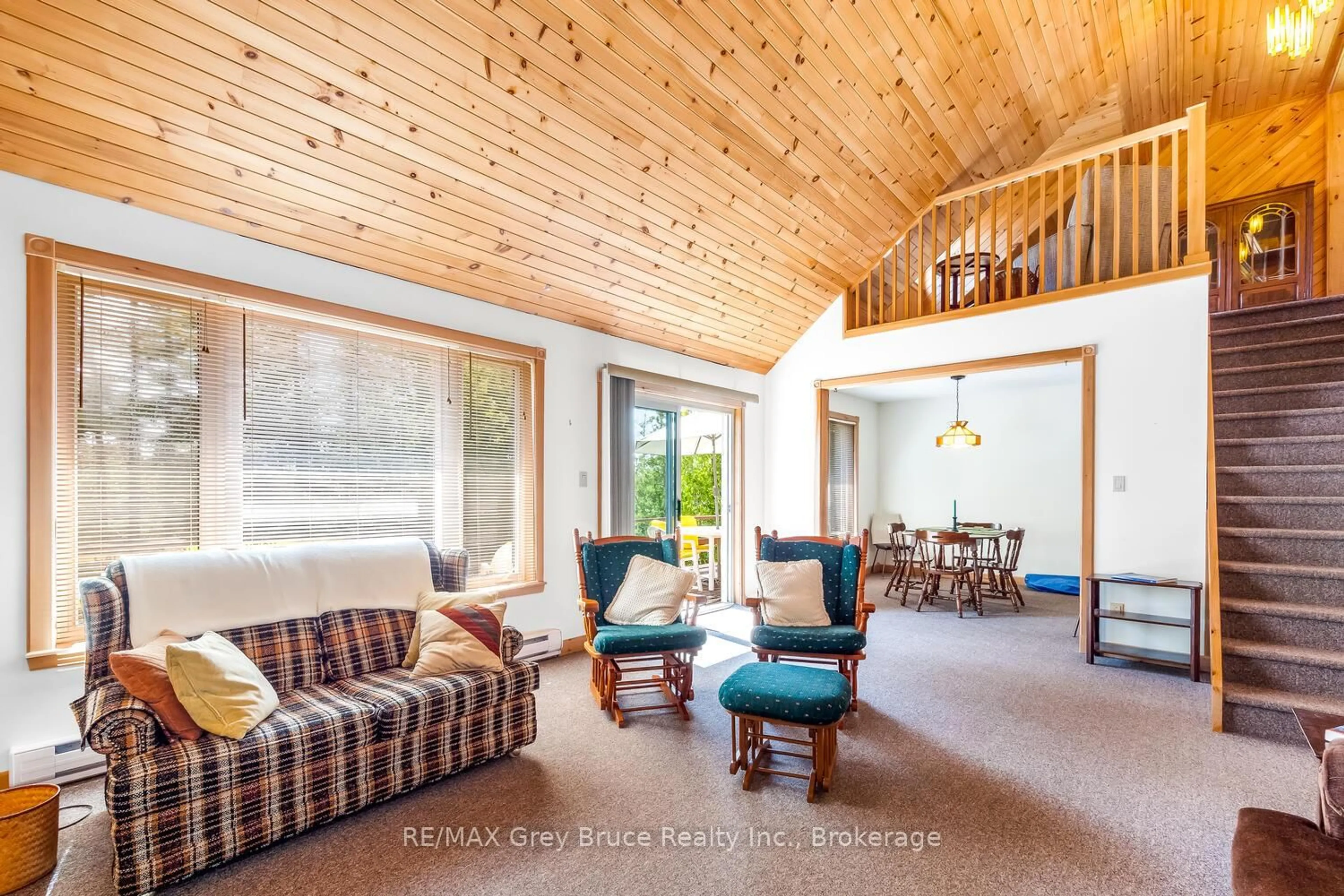 Living room with furniture, wood/laminate floor for 159 Zorra Dr, Northern Bruce Peninsula Ontario N0H 2R0