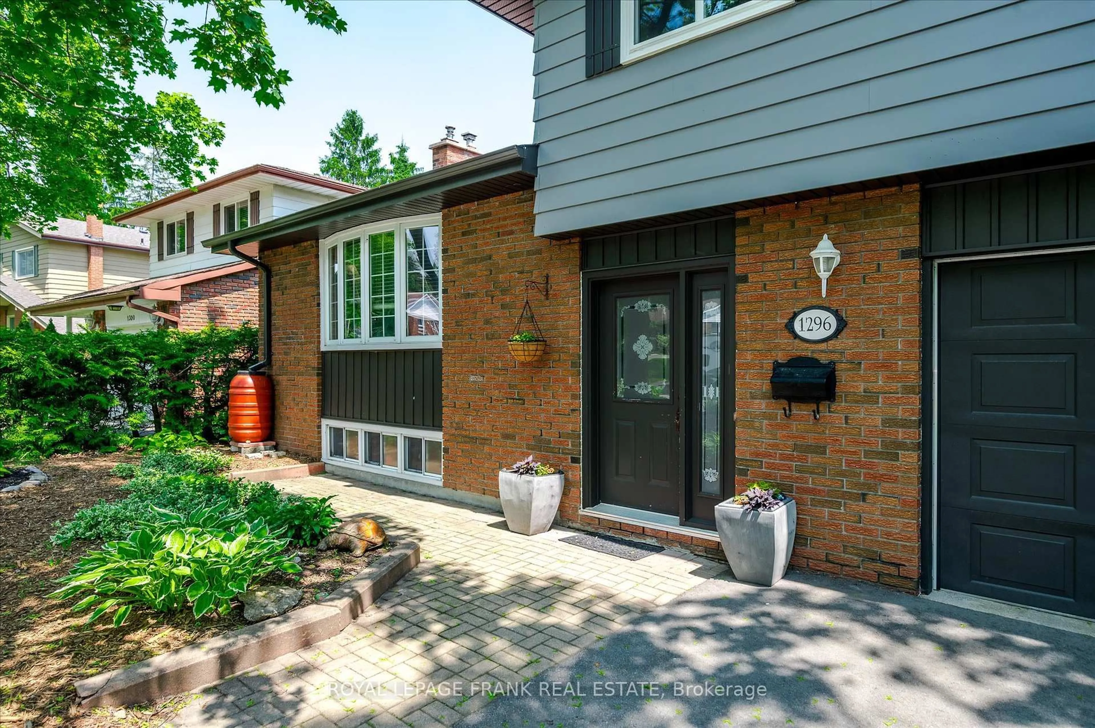 Home with brick exterior material, street for 1296 Cartier Blvd, Peterborough Ontario K9H 6S1