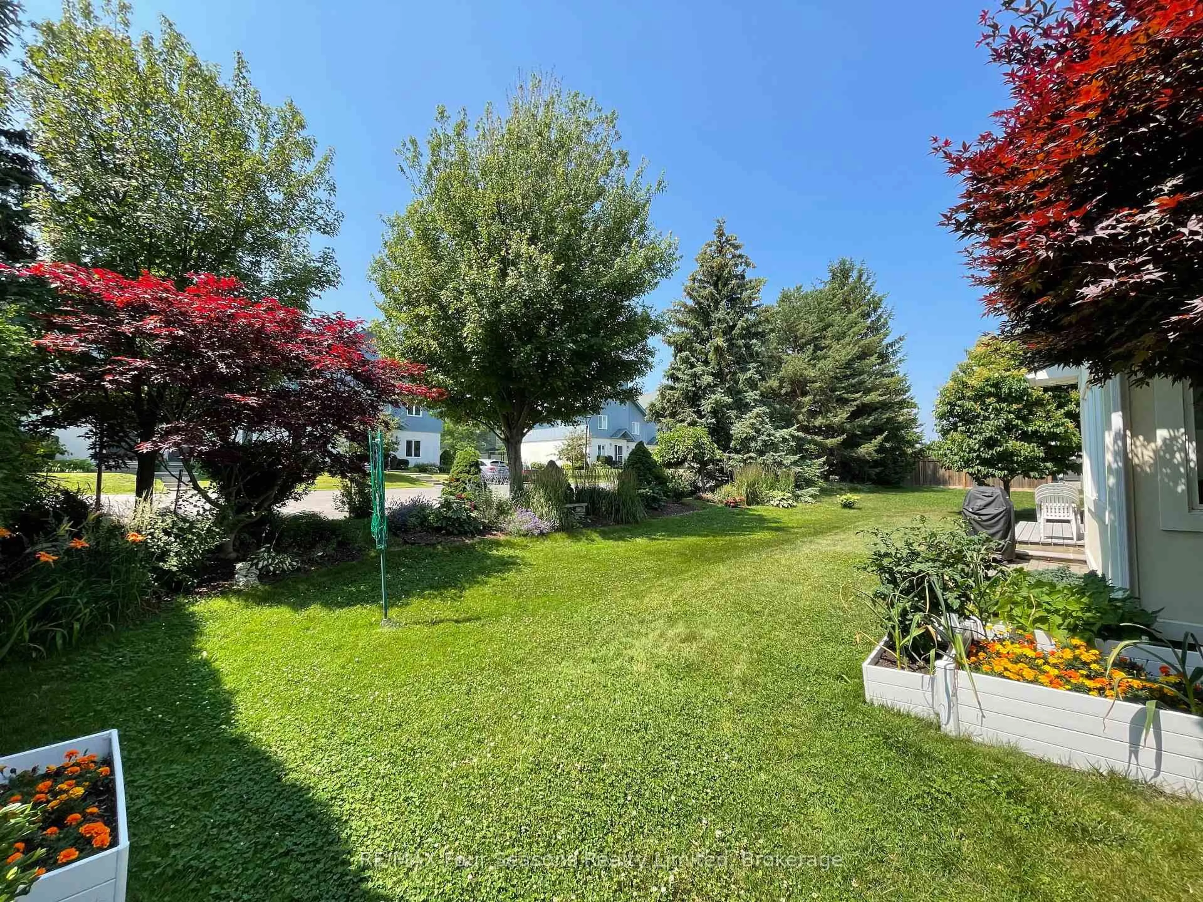A pic from outside/outdoor area/front of a property/back of a property/a pic from drone, forest/trees view for 150 Brooker Blvd, Blue Mountains Ontario L9Y 0M2