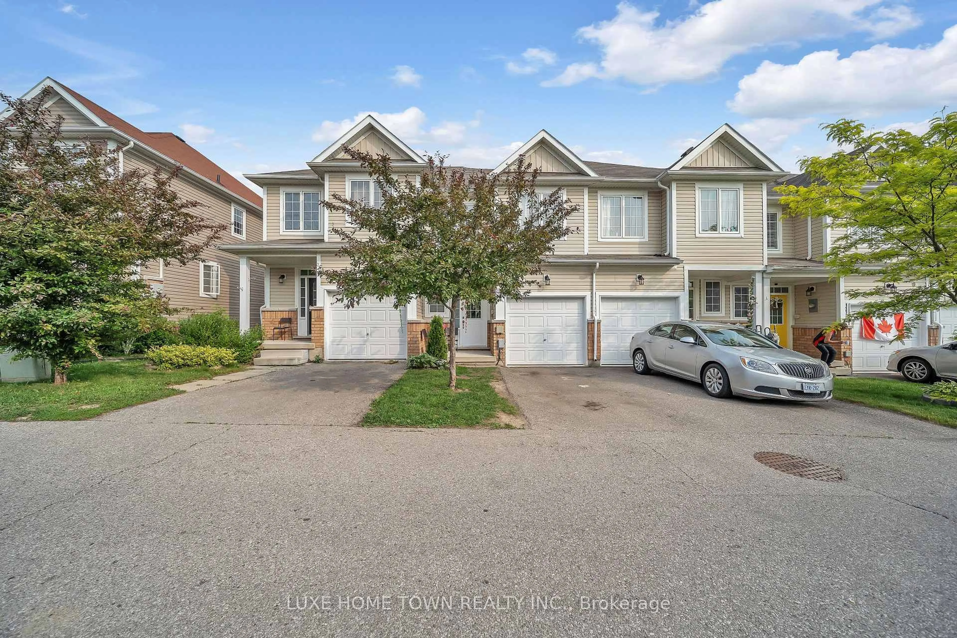 A pic from outside/outdoor area/front of a property/back of a property/a pic from drone, street for 21 Diana Ave #135, Brantford Ontario N3T 0G7