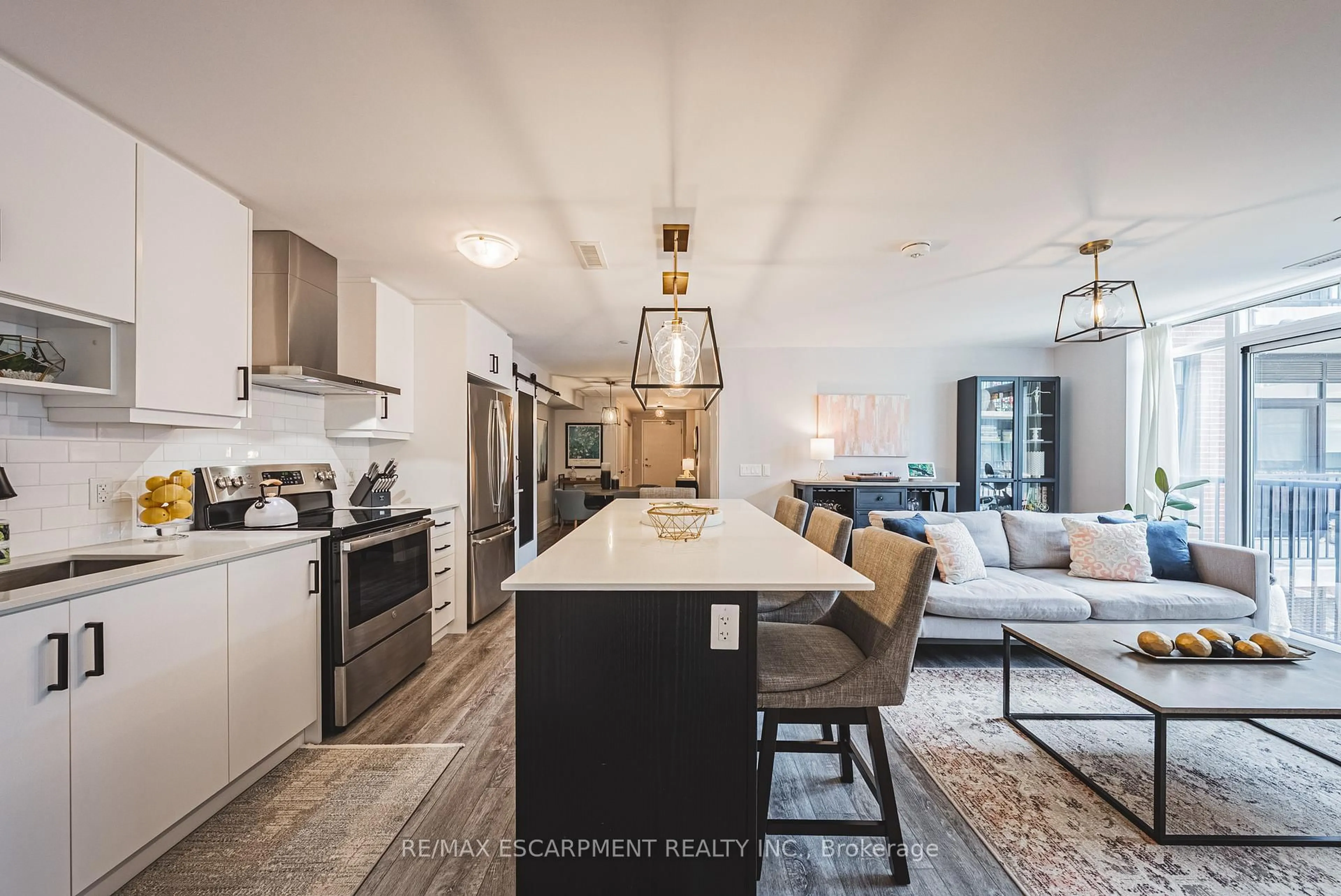 Open concept kitchen, ceramic/tile floor for 1 Redfern Ave #312, Hamilton Ontario L9C 0E6