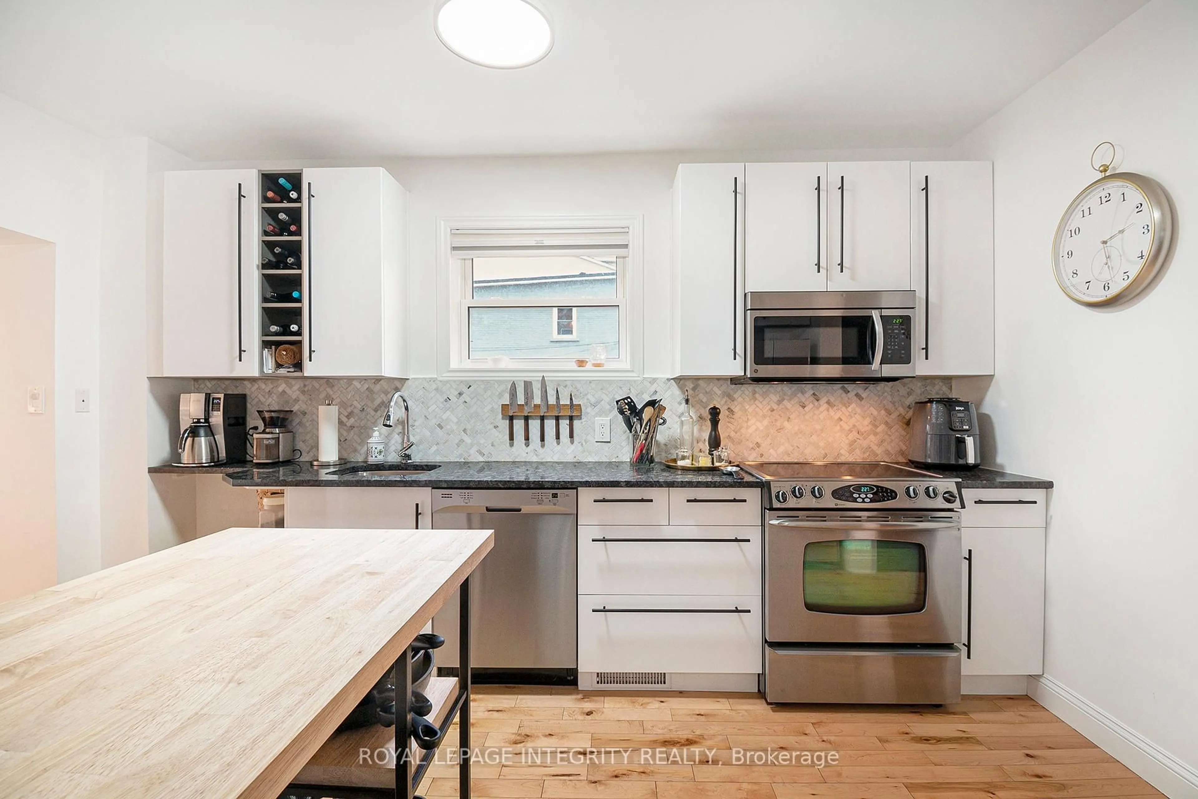Contemporary kitchen, ceramic/tile floor for 120 Stirling Ave, Ottawa Ontario K1Y 1R3