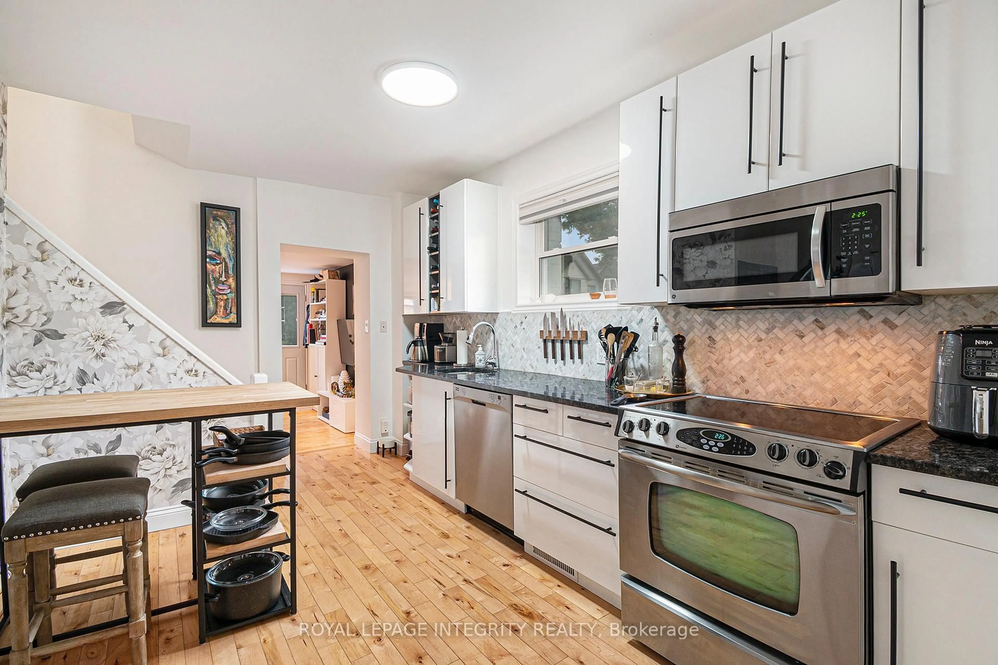 Open concept kitchen, ceramic/tile floor for 120 Stirling Ave, Ottawa Ontario K1Y 1R3