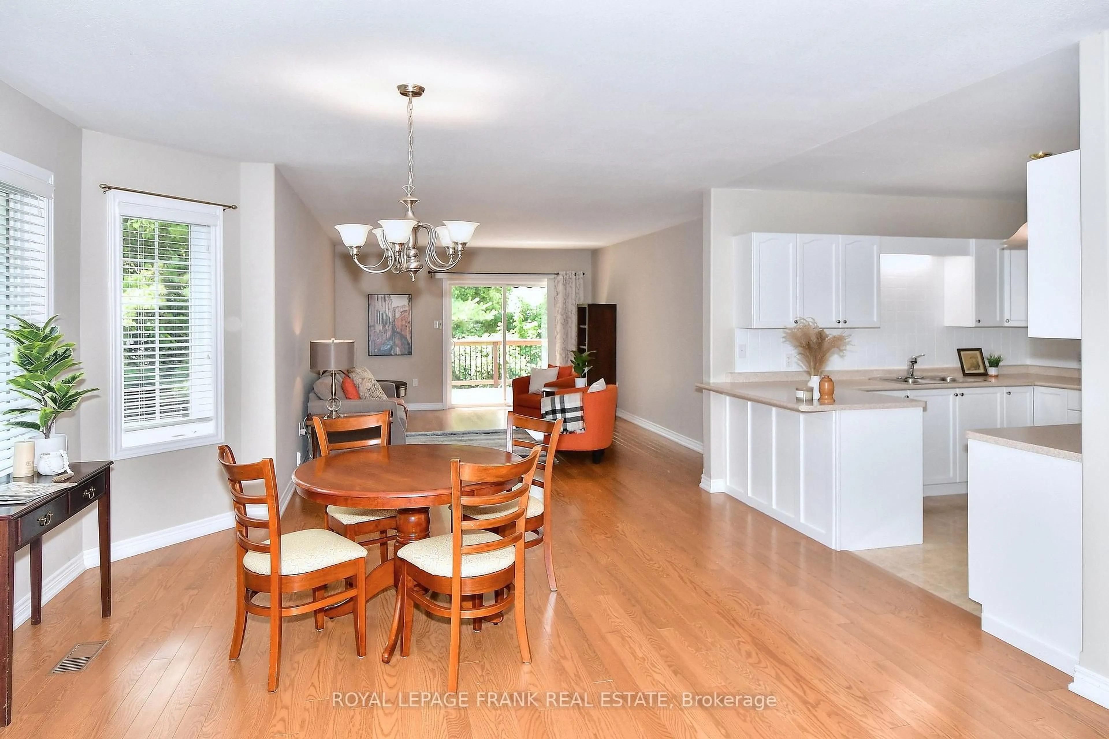 Open concept kitchen, wood/laminate floor for 7 Village Cres, Peterborough West Ontario K9J 8S7